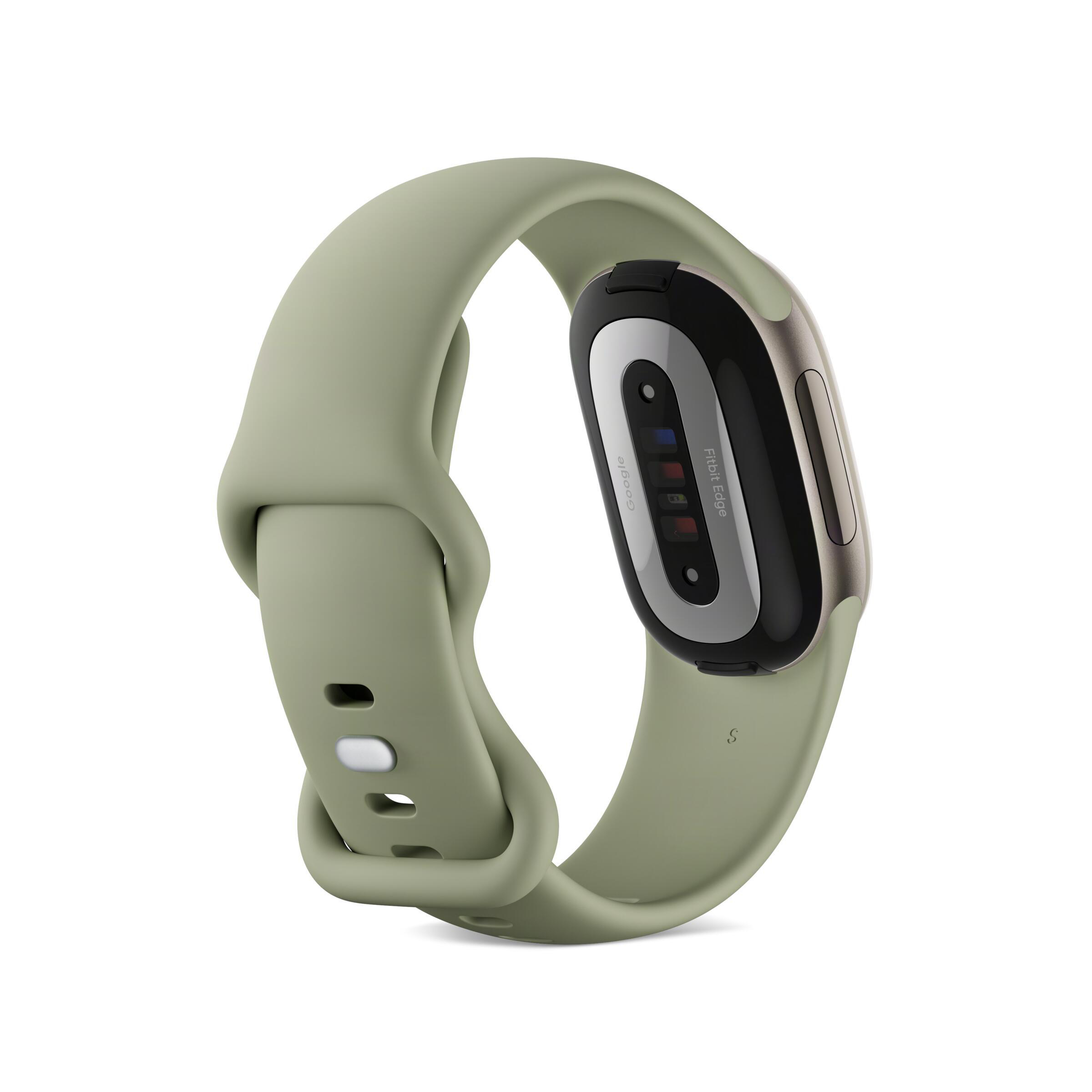 Unterseite einer Smartwatch in Salbeigruen mit Sensoren und Kameras auf weissem Hintergrund.