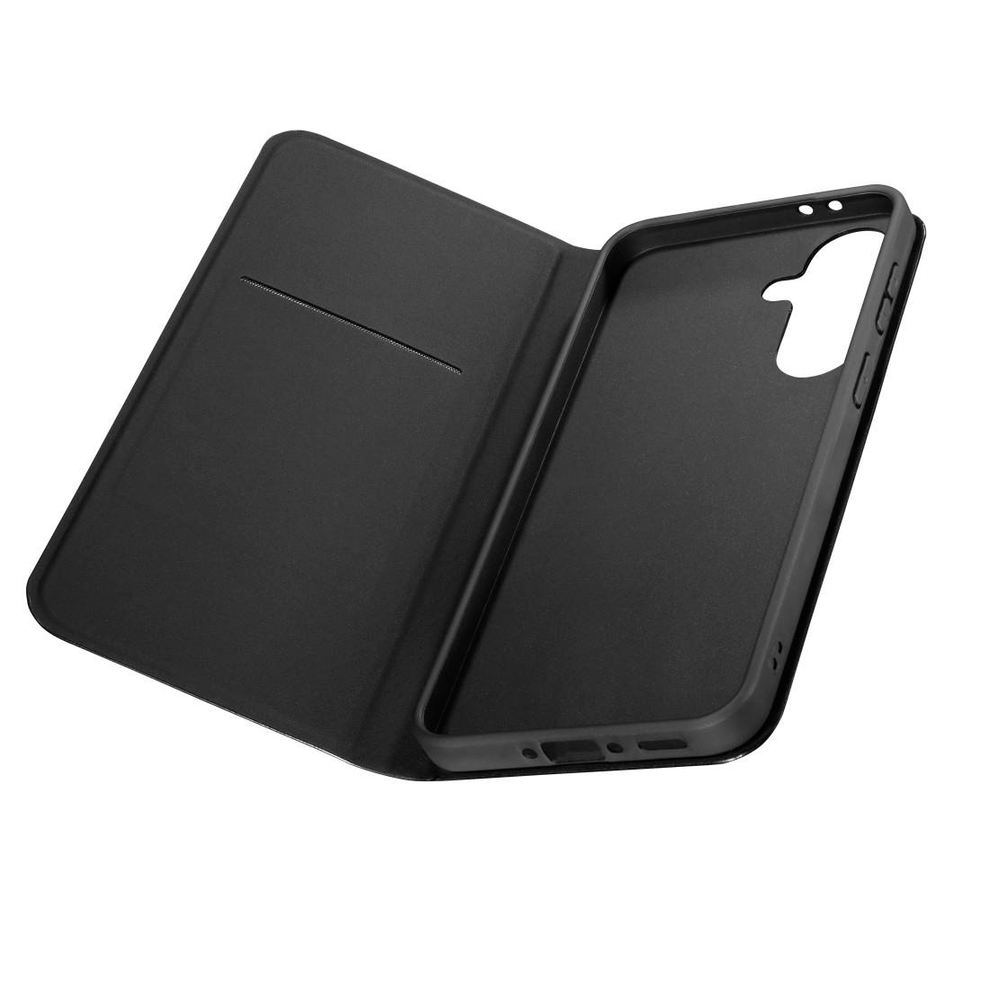 Eine schwarze Handytasche zum Aufklappen auf weißem Hintergrund.