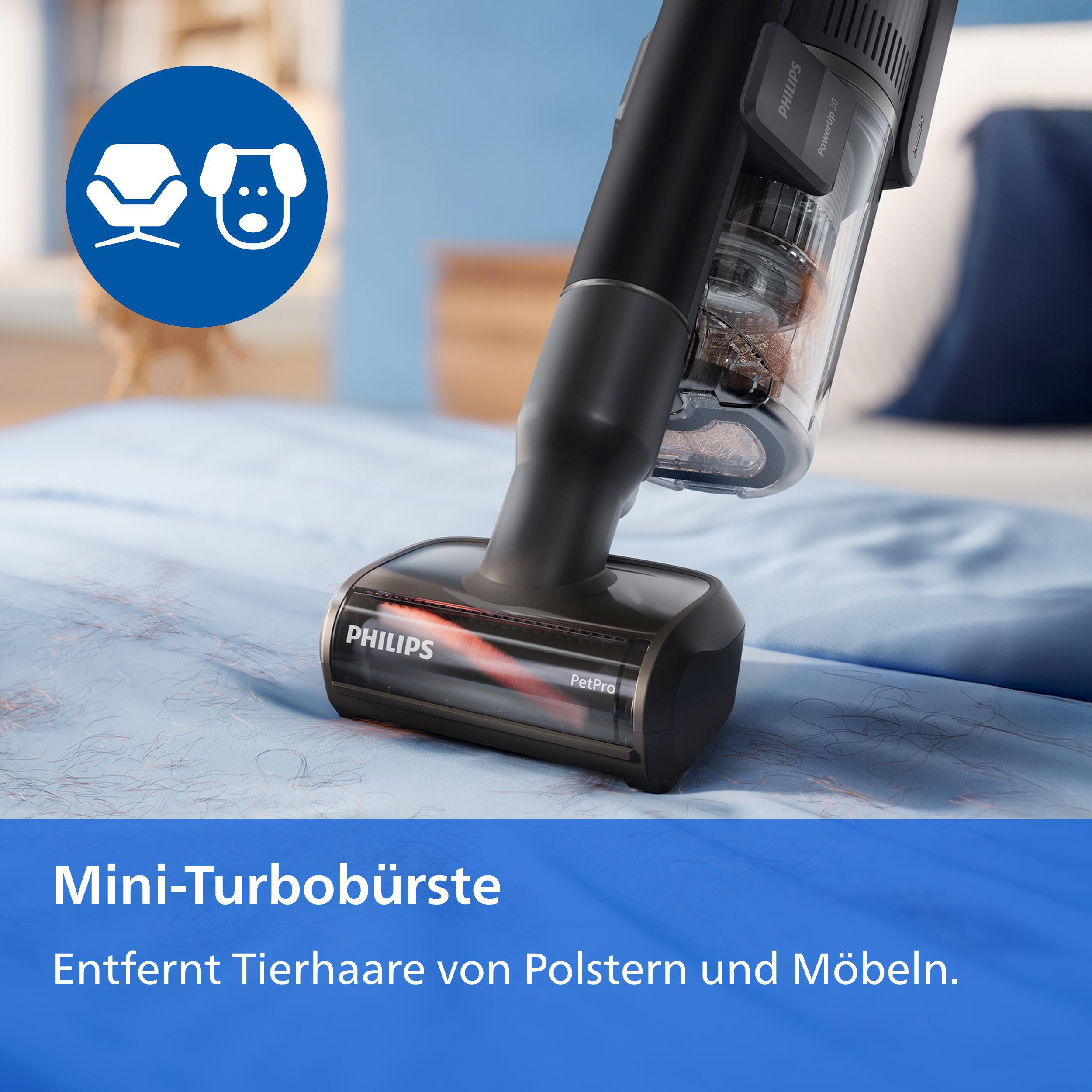 Philips Staubsauger entfernt Tierhaare von einem blauen Bett.