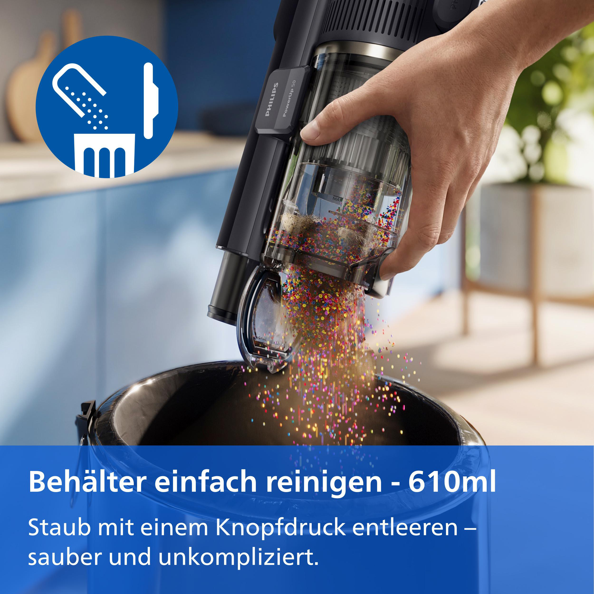 Eine Hand entleert einen Staubsaugerbehälter voller bunter Perlen in einen Mülleimer.