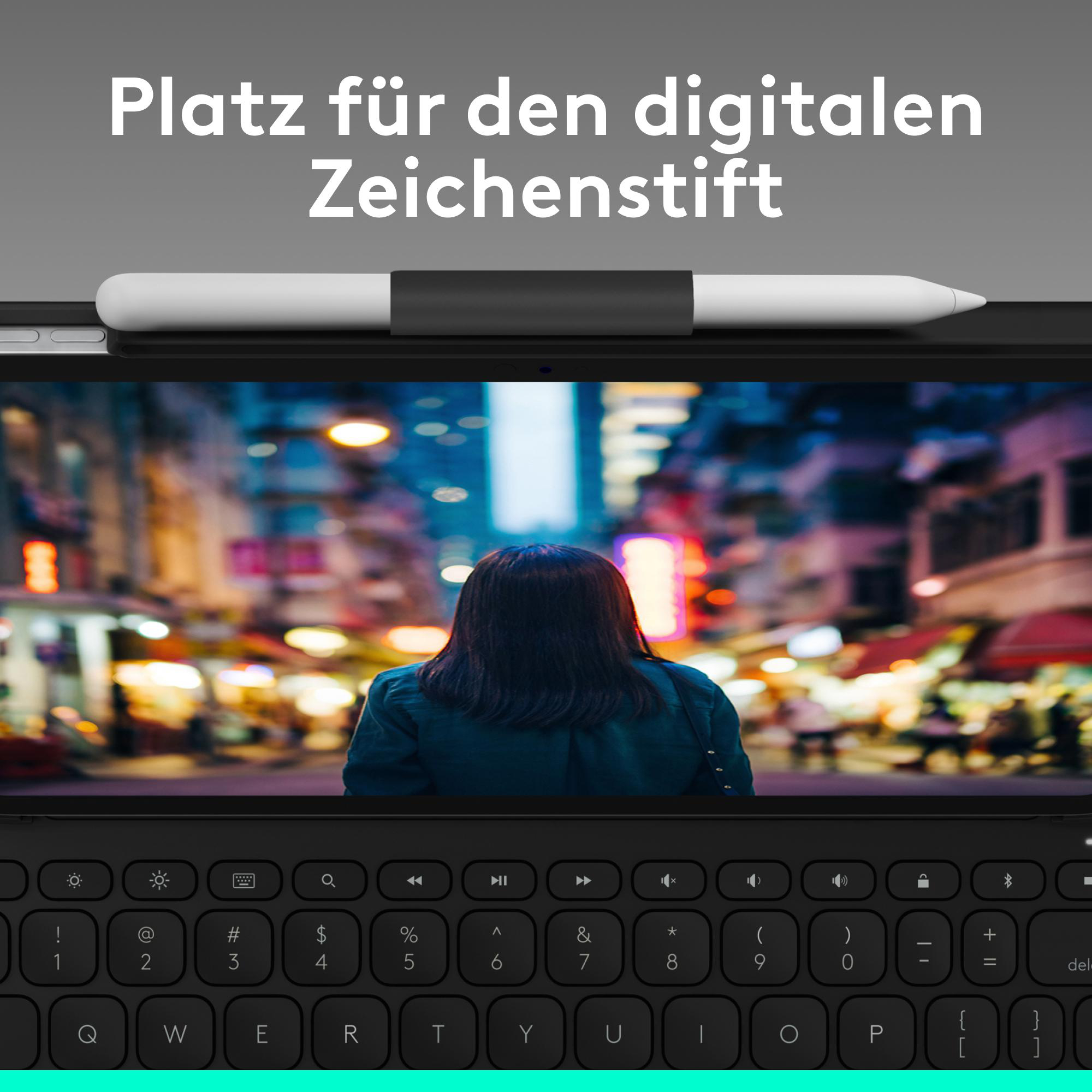 Ein Tablet mit Tastatur, digitalem Stift und einem Bild einer Frau auf dem beleuchteten Bildschirm.