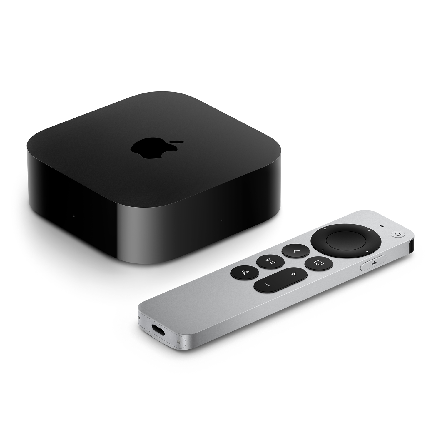 Zwarte Apple TV-box en zilveren afstandsbediening op witte achtergrond.