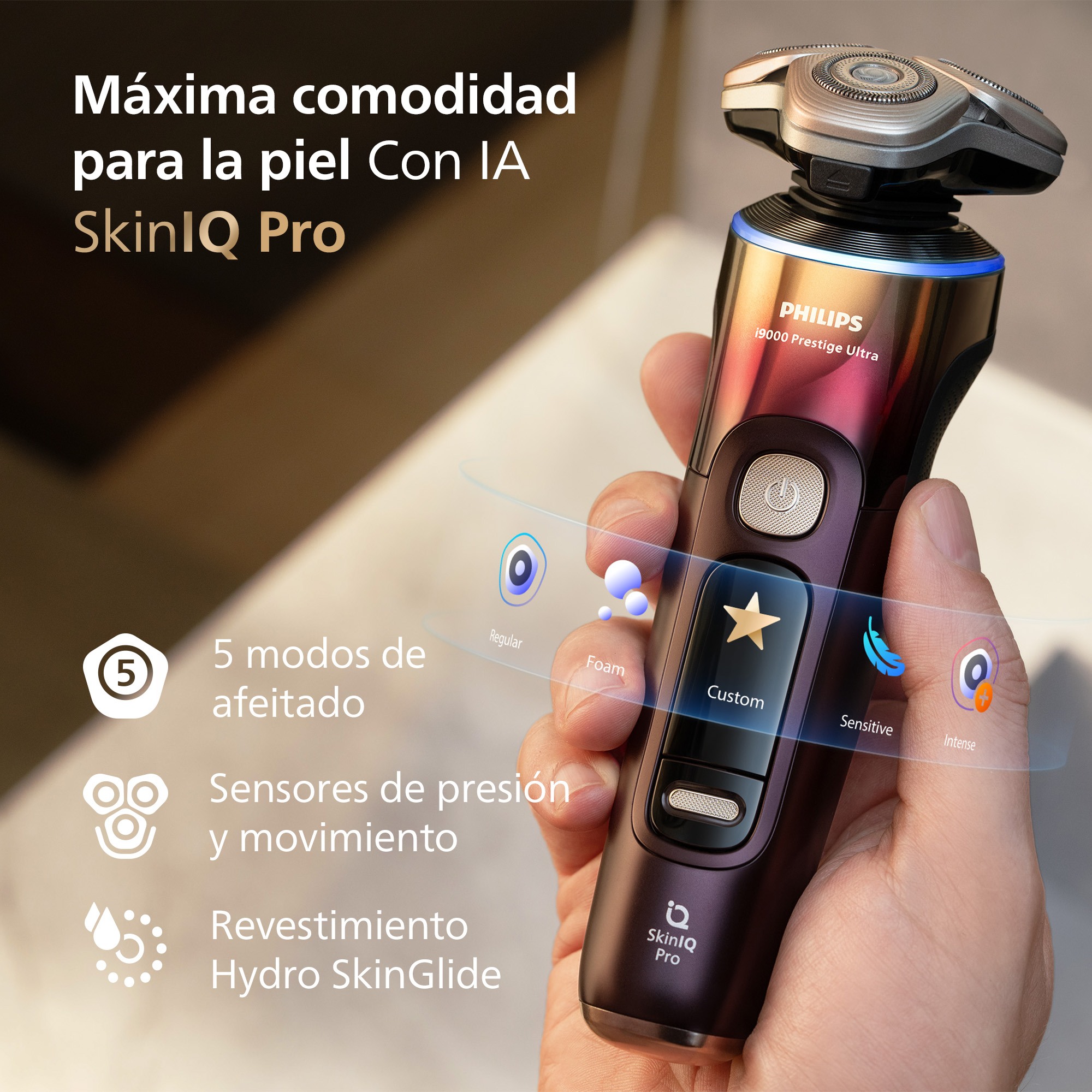 Mano sostiene una afeitadora Philips Prestige Ultra con tecnología SkinIQ Pro y varios modos.