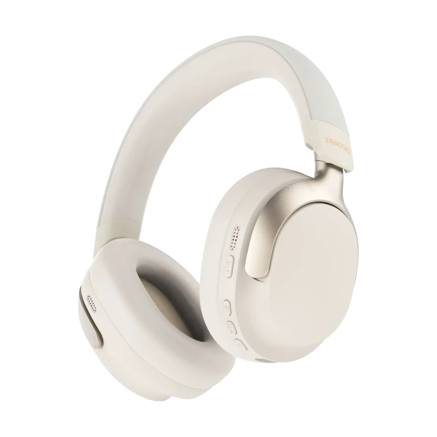 Auriculares supraaurales color crema con detalles dorados y botones sobre fondo negro.