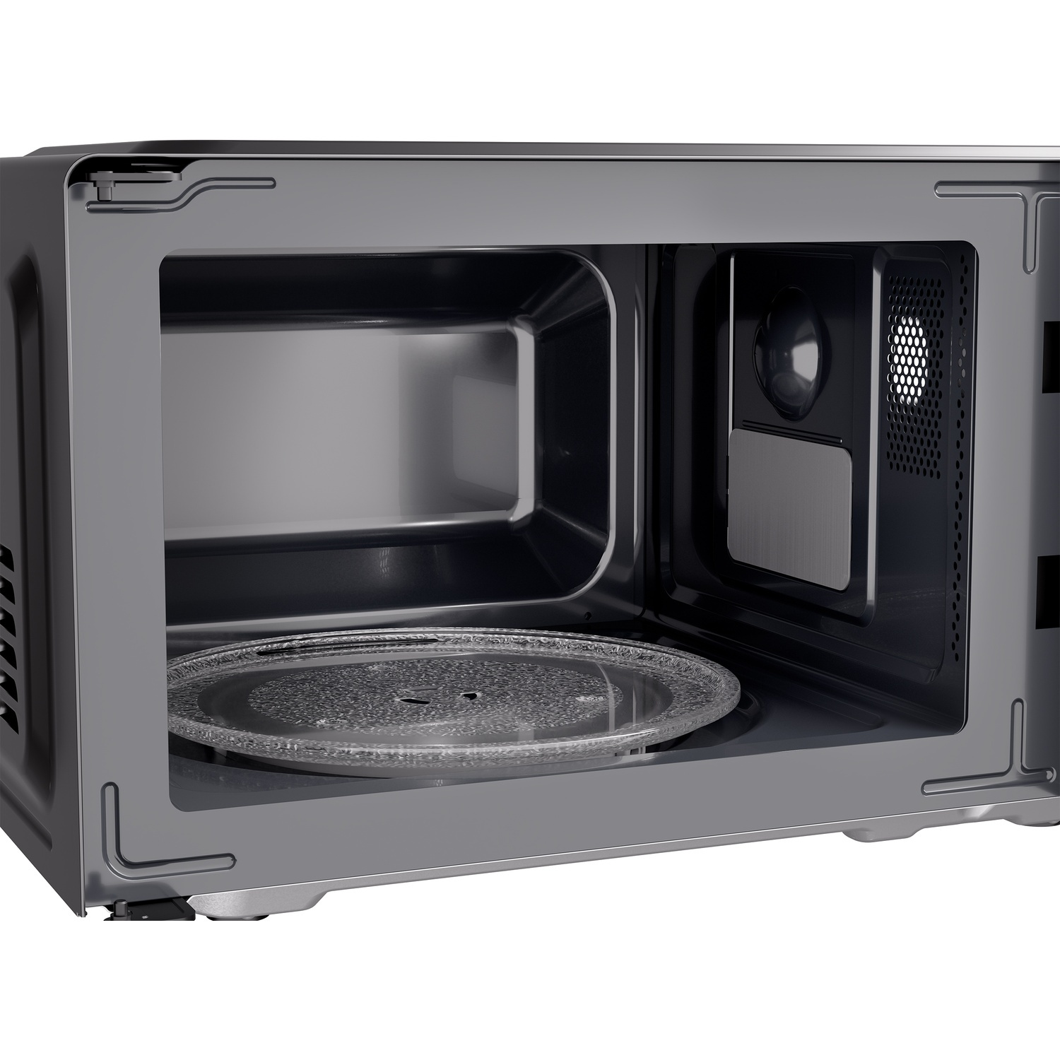 An open black microwave interior with a glass turntable plate and a light on the right side.