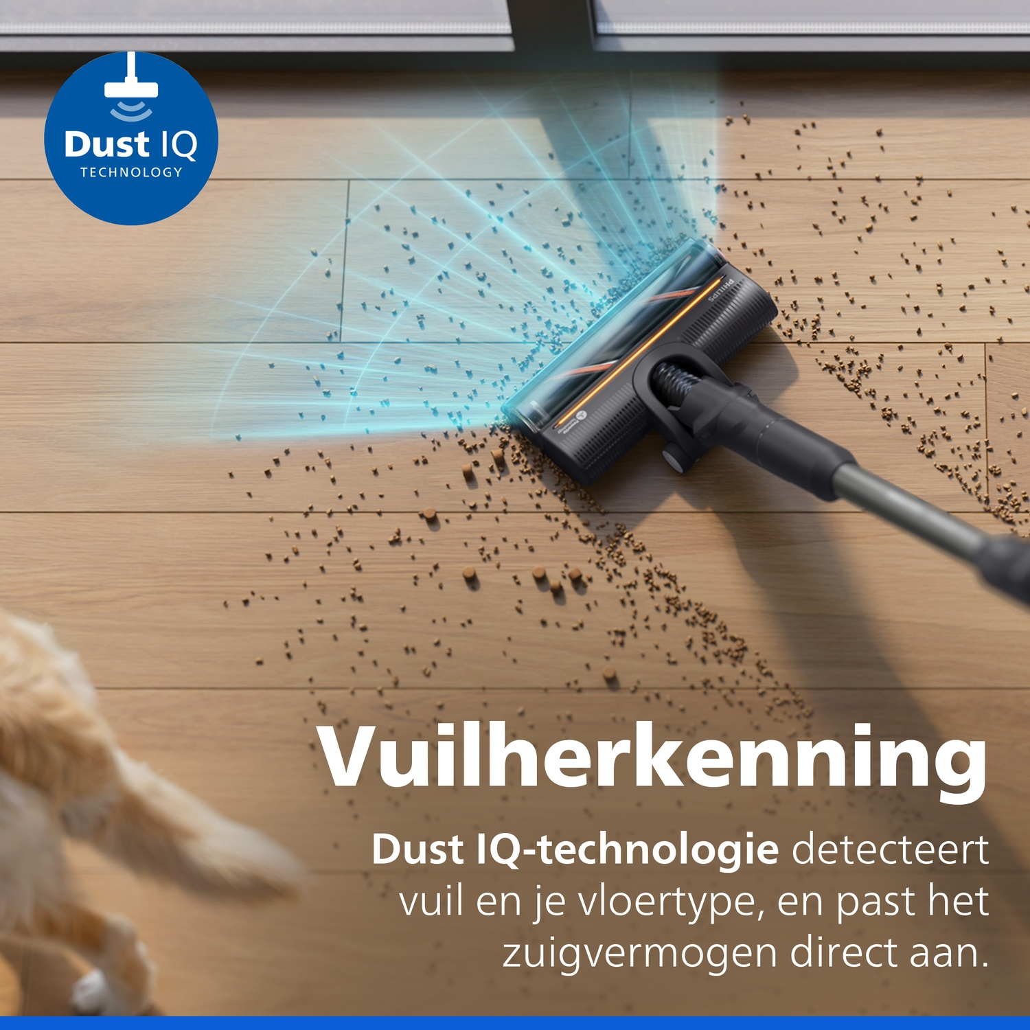 Vacuum cleaner nozzle with dust detection cleans debris from wooden floor.