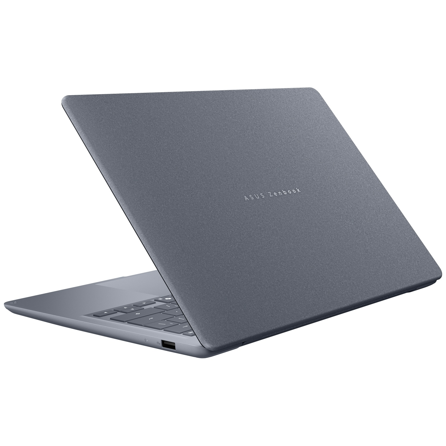 Een gesloten grijze ASUS Zenbook laptop op een witte achtergrond, van opzij bekeken.