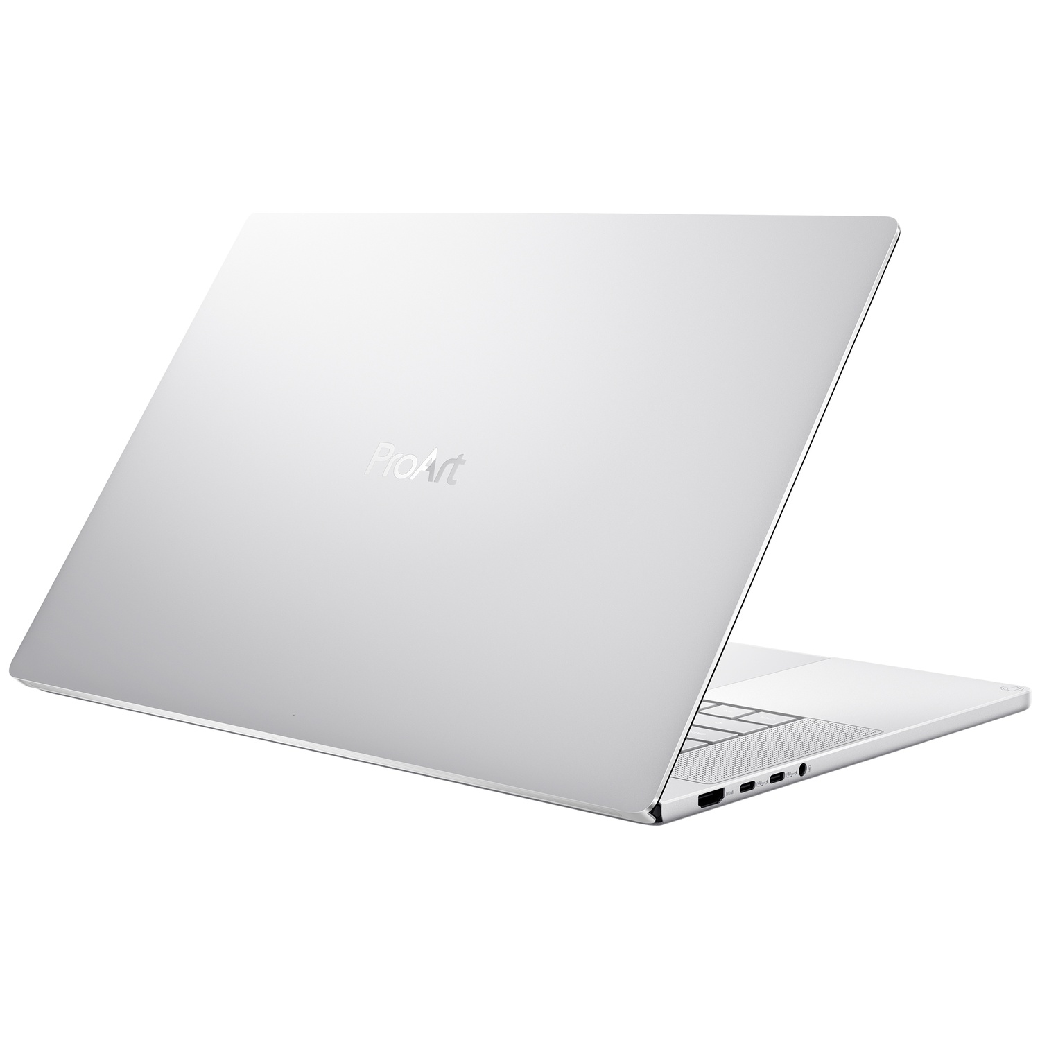 A silver ProArt laptop stands on a white background, with visible ports on the side.