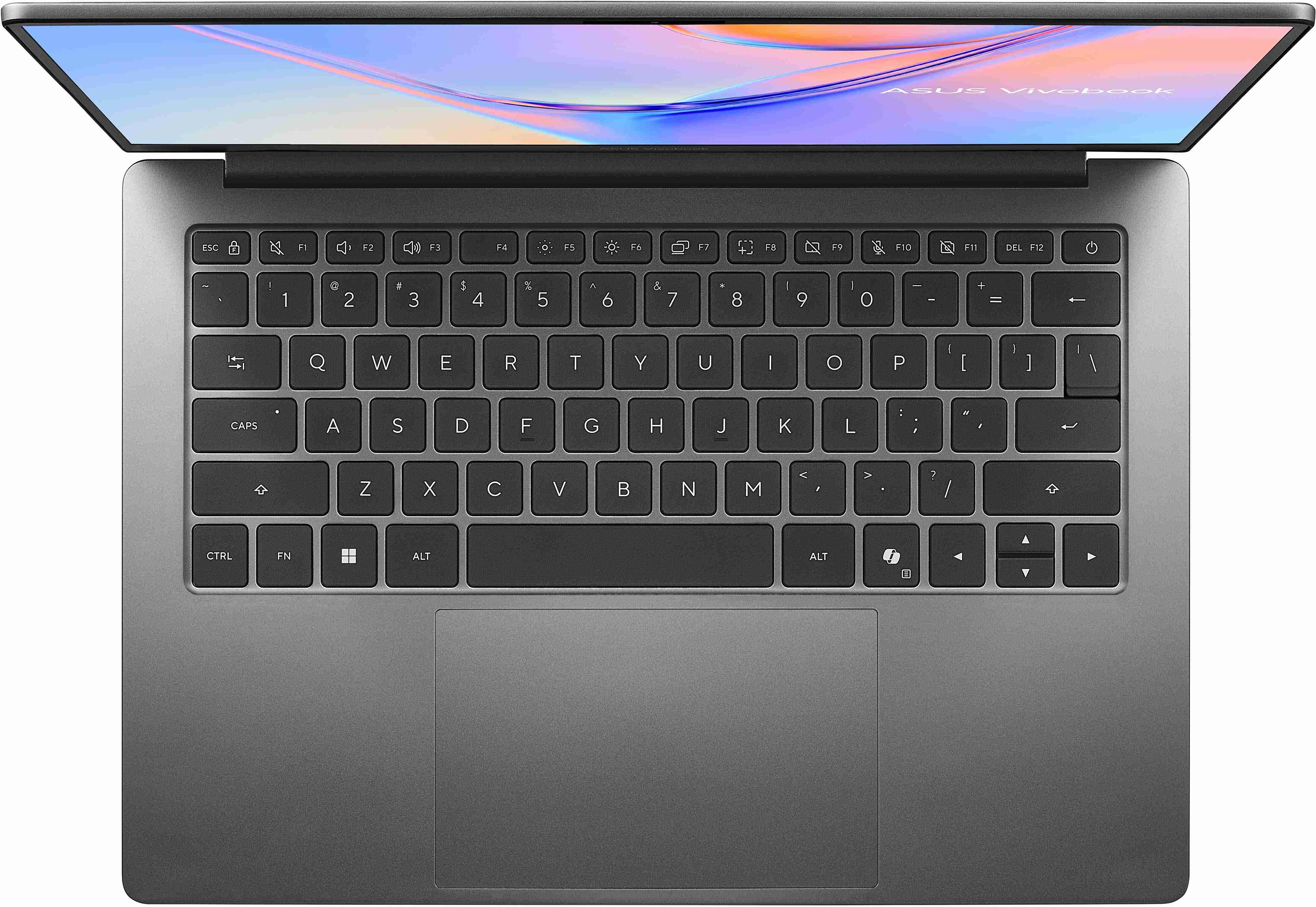 Szürke laptop felülről nézve, nyitott képernyővel és billentyűzettel.