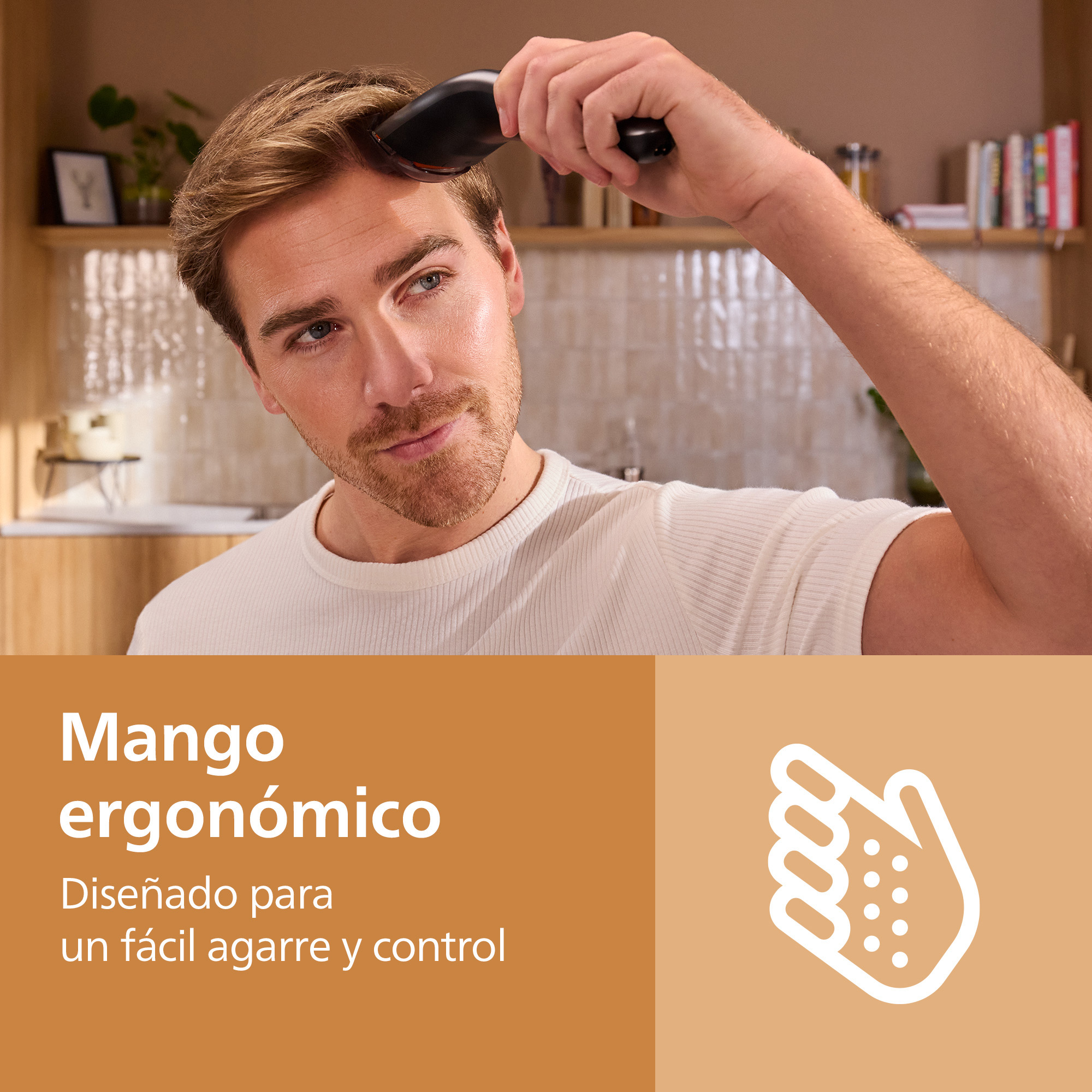 Un hombre se corta el pelo con una afeitadora ergonómica en una cocina.