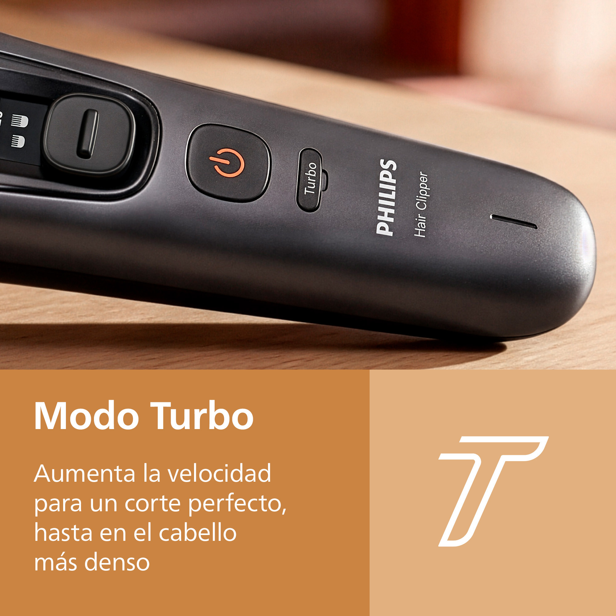 Primer plano de una cortapelos Philips gris con botón turbo y texto en español.