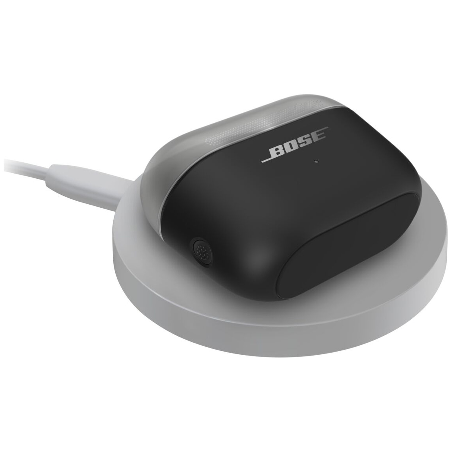 Boîtier de charge Bose noir sur un socle de charge rond et gris avec un câble blanc.