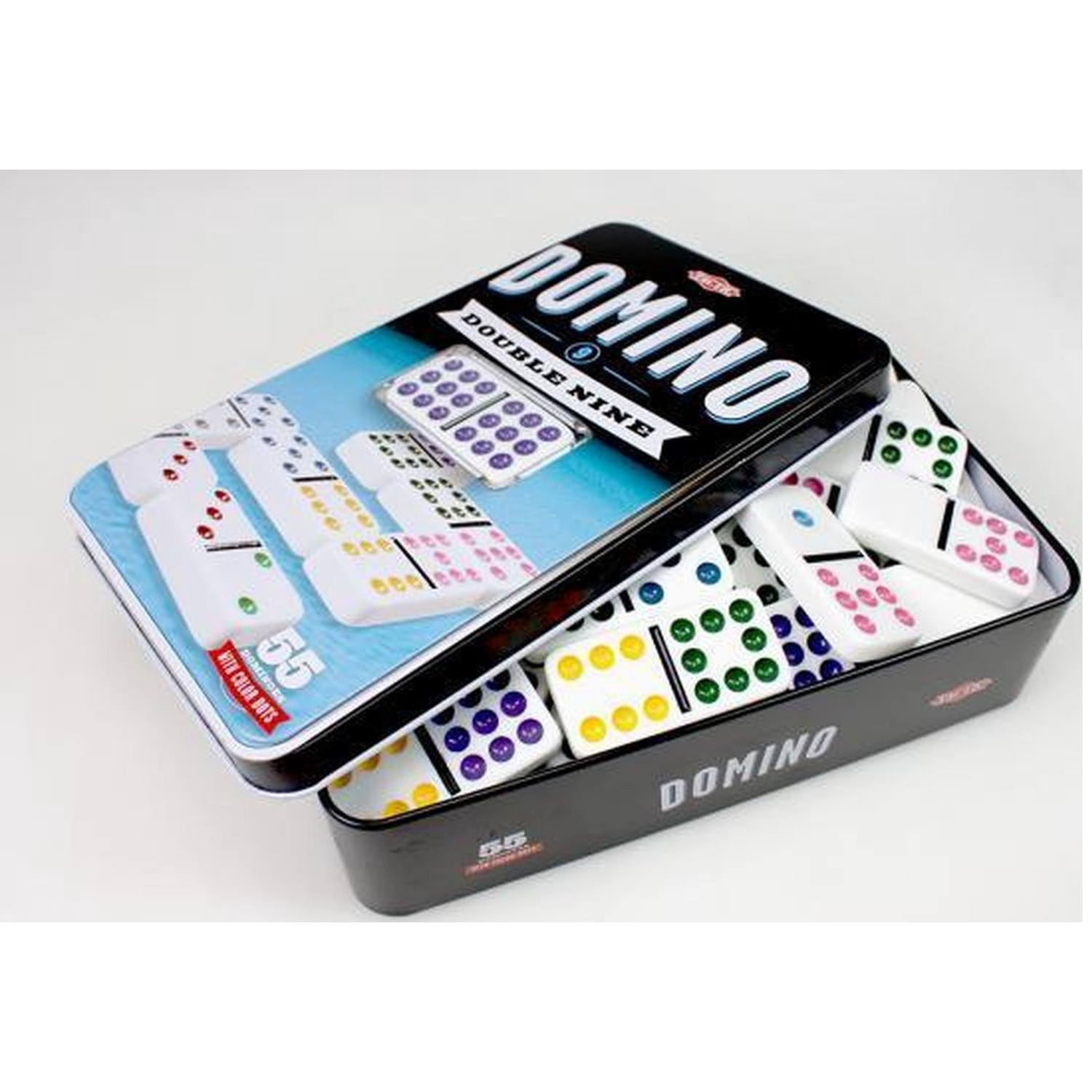 An open black metal tin reveals colorful domino tiles inside and on the lid.