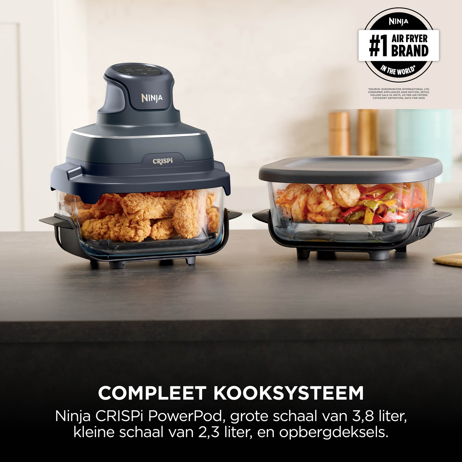 Ninja Crispi air fryer with two glass containers filled with chicken and shrimp on a kitchen counter.