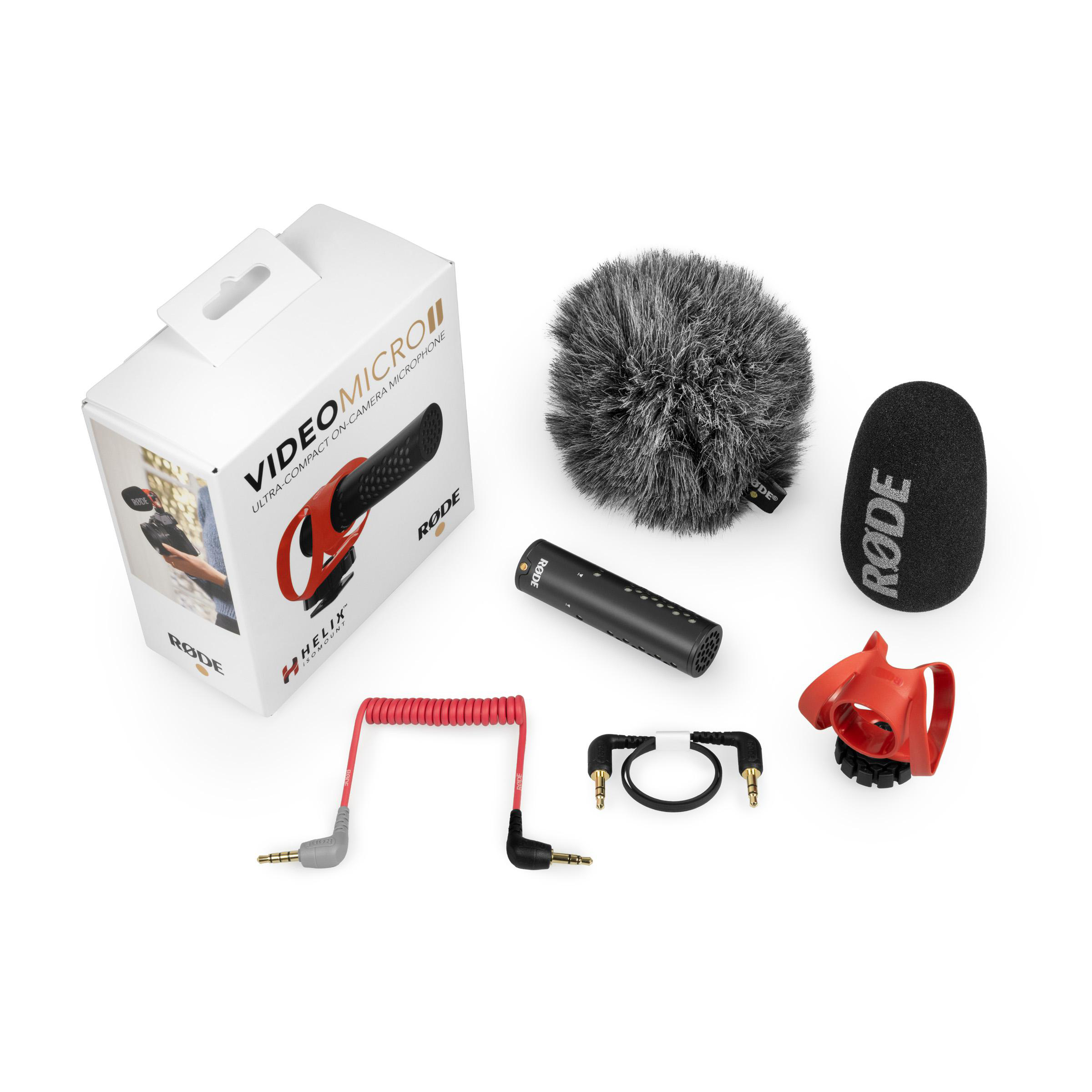 Rode VideoMicro II Mikrofon mit Verpackung, Fellwindschutz, Schaumstoffwindschutz, Halterung und Kabeln.
