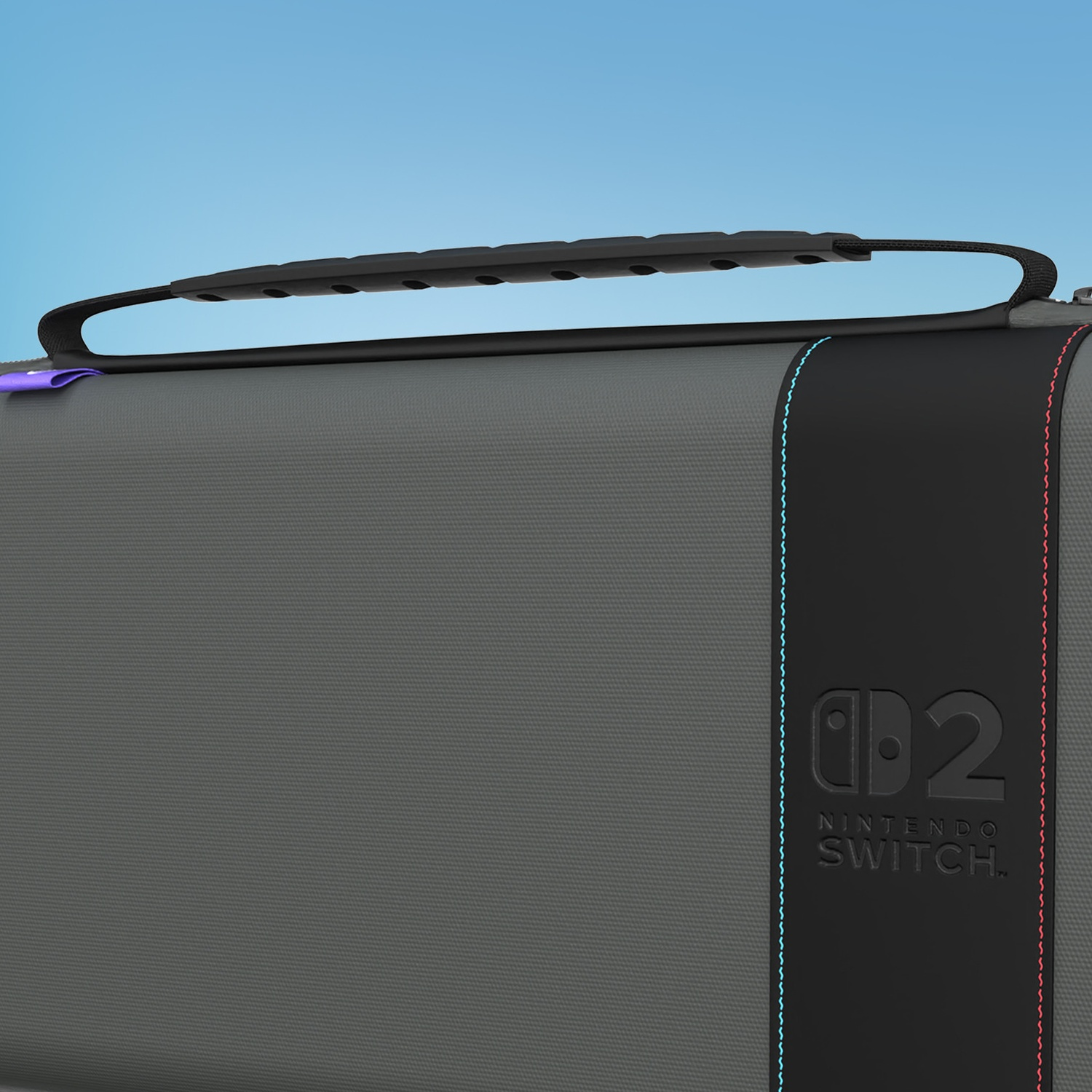 Gray Nintendo Switch 2 hard case with a black handle and blue-red stitching.