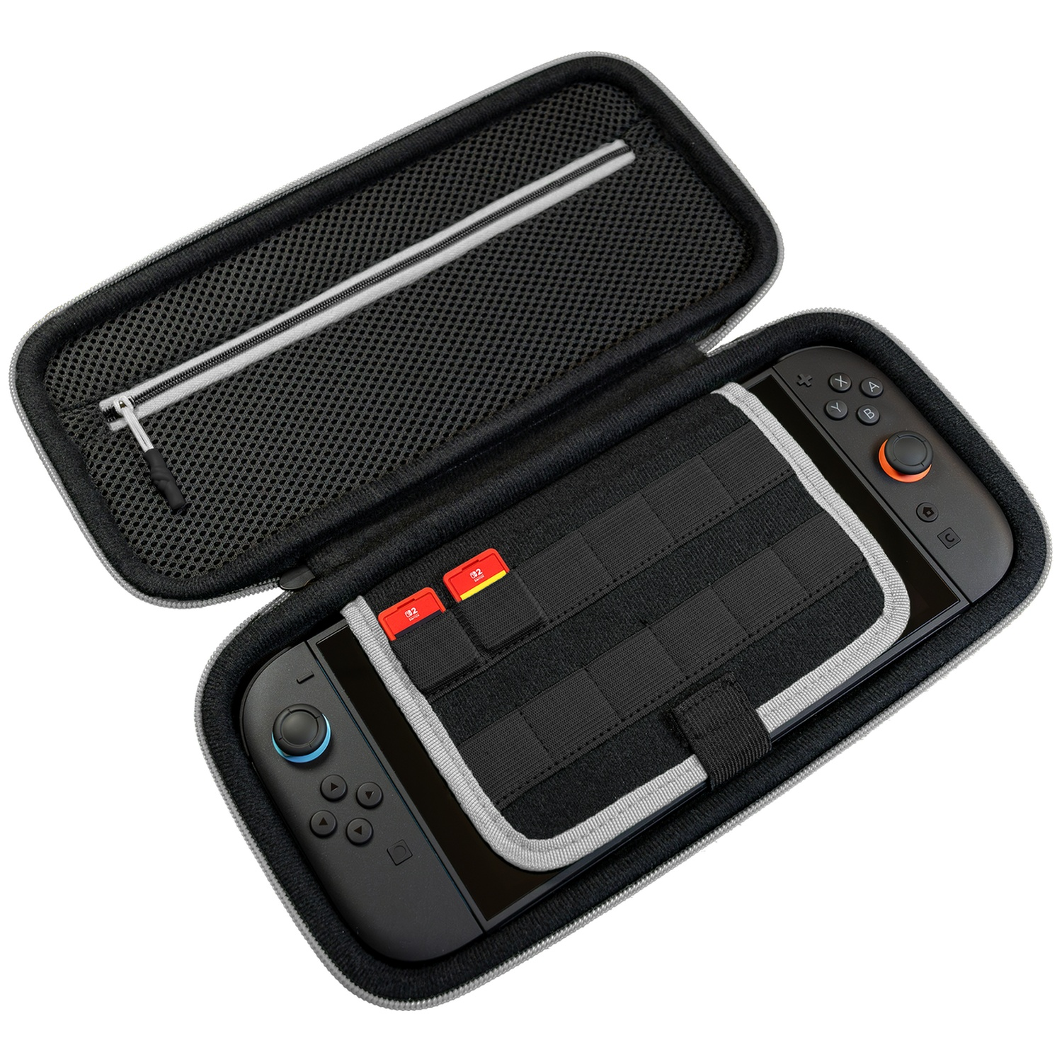 Black zipped gaming console case containing a console and two red memory cards inside.