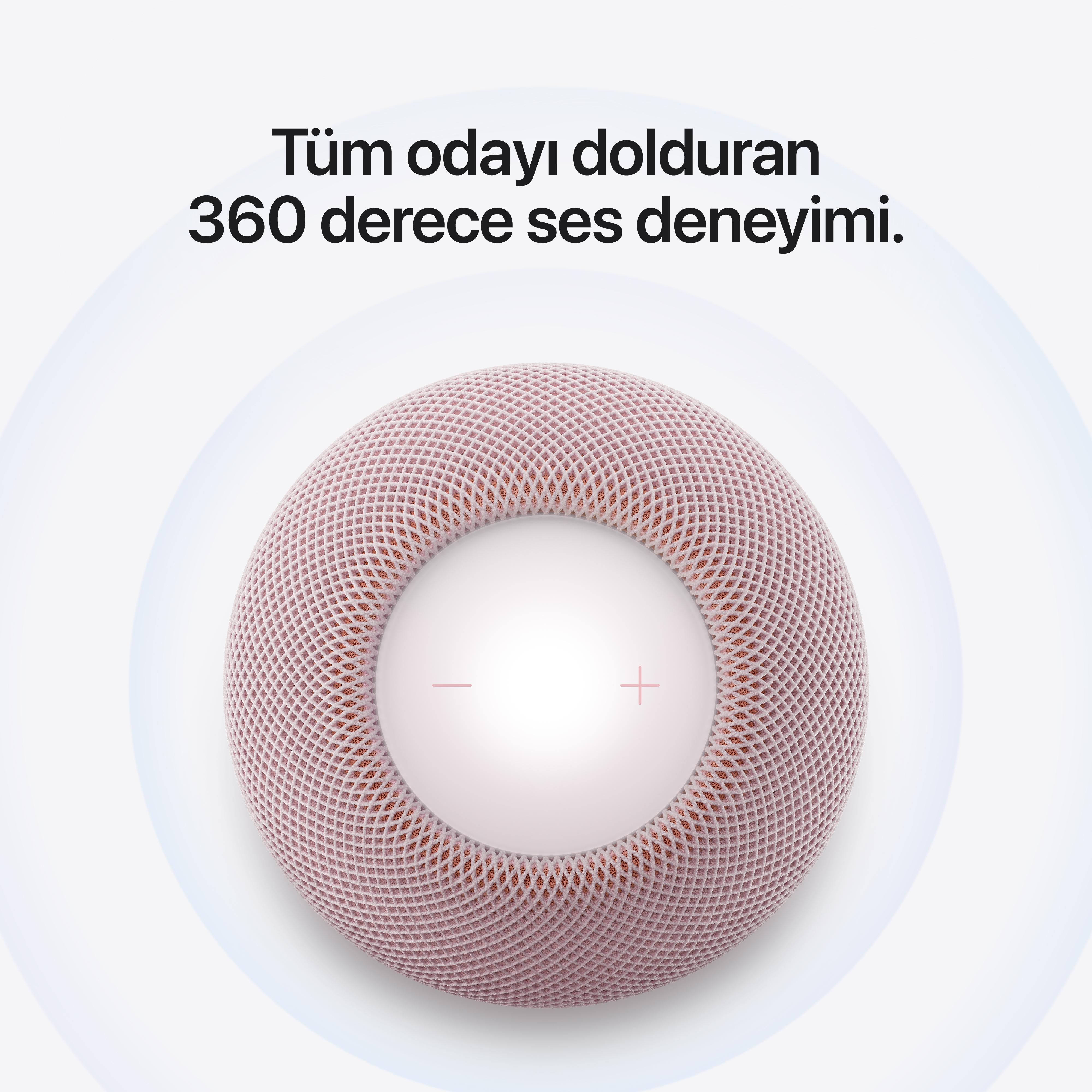Üstünde ses düğmeleri olan pembe örgü akıllı hoparlör, beyaz arka planda Türkçe yazıyla.