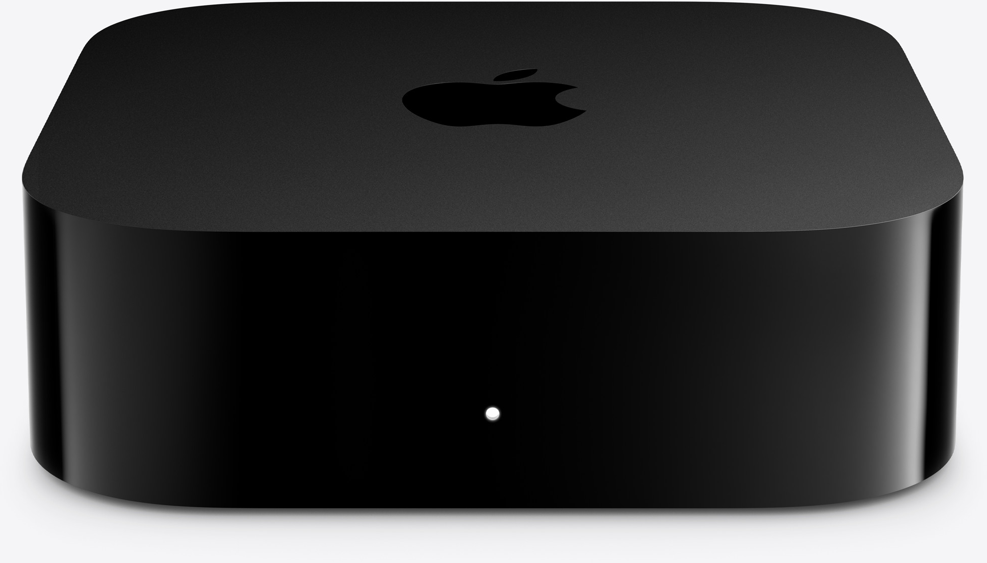 Egy fekete Mac Studio tetején Apple logóval és elöl egy kis fehér LED fénnyel.