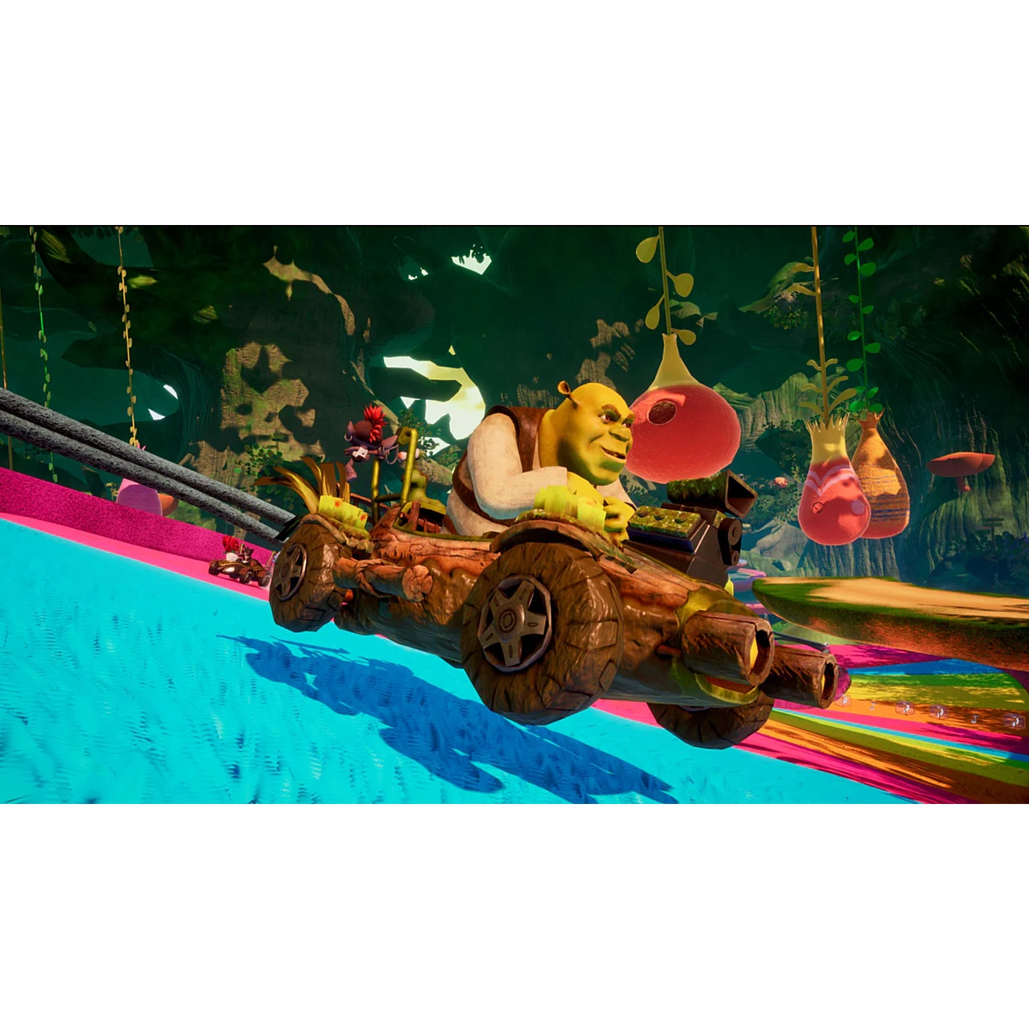 Shrek drives a wooden go-kart on a colorful track through a jungle.