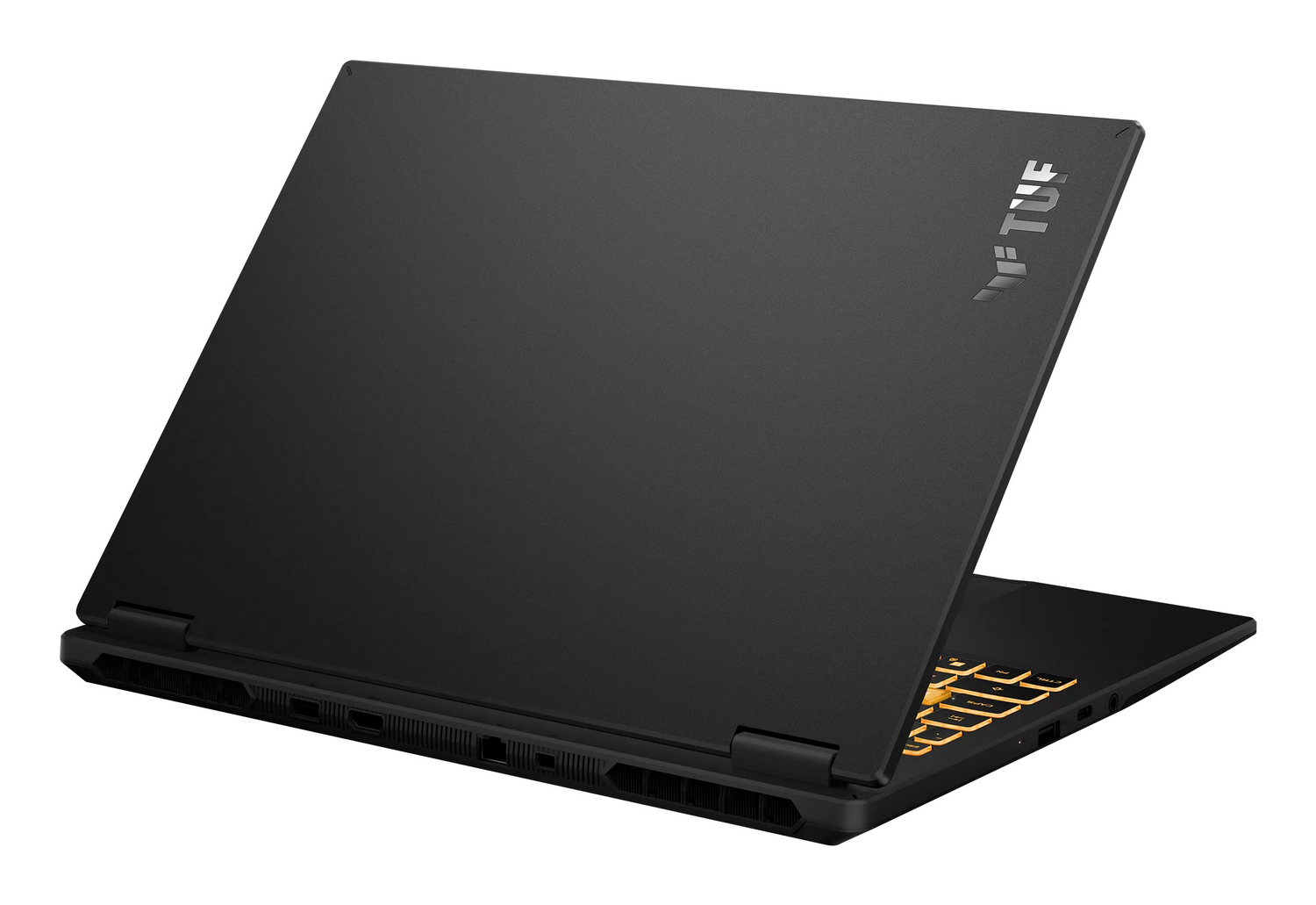 Un portátil de juegos Asus TUF negro sobre una superficie blanca, mostrando la tapa y la retroiluminación.