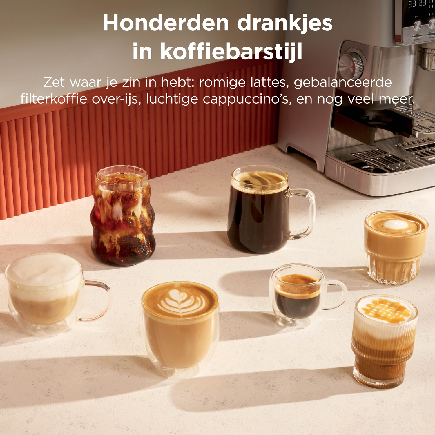 Various coffee drinks are arranged on a counter in front of a coffee machine.