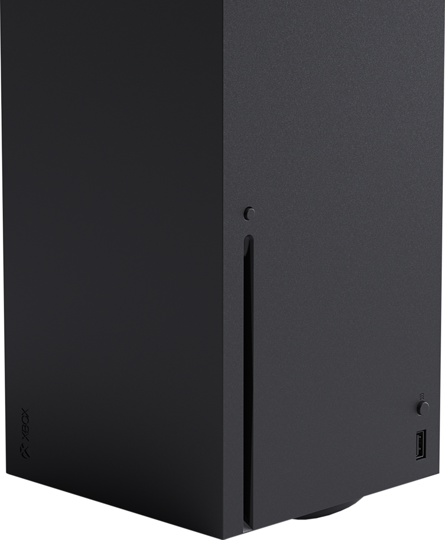 Gros plan sur une console Xbox Series X noir mat avec la fente pour disque et le bouton d'alimentation.