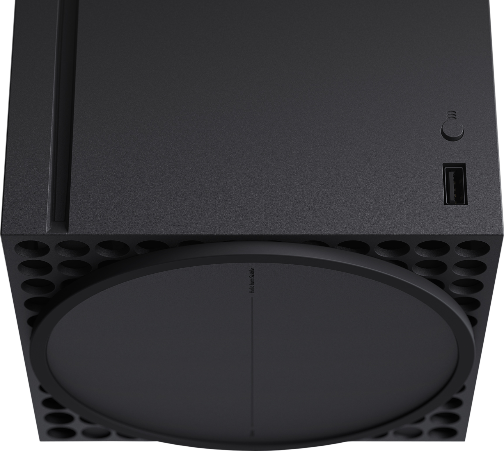 Console Xbox Series X noire avec base circulaire et trous de ventilation.