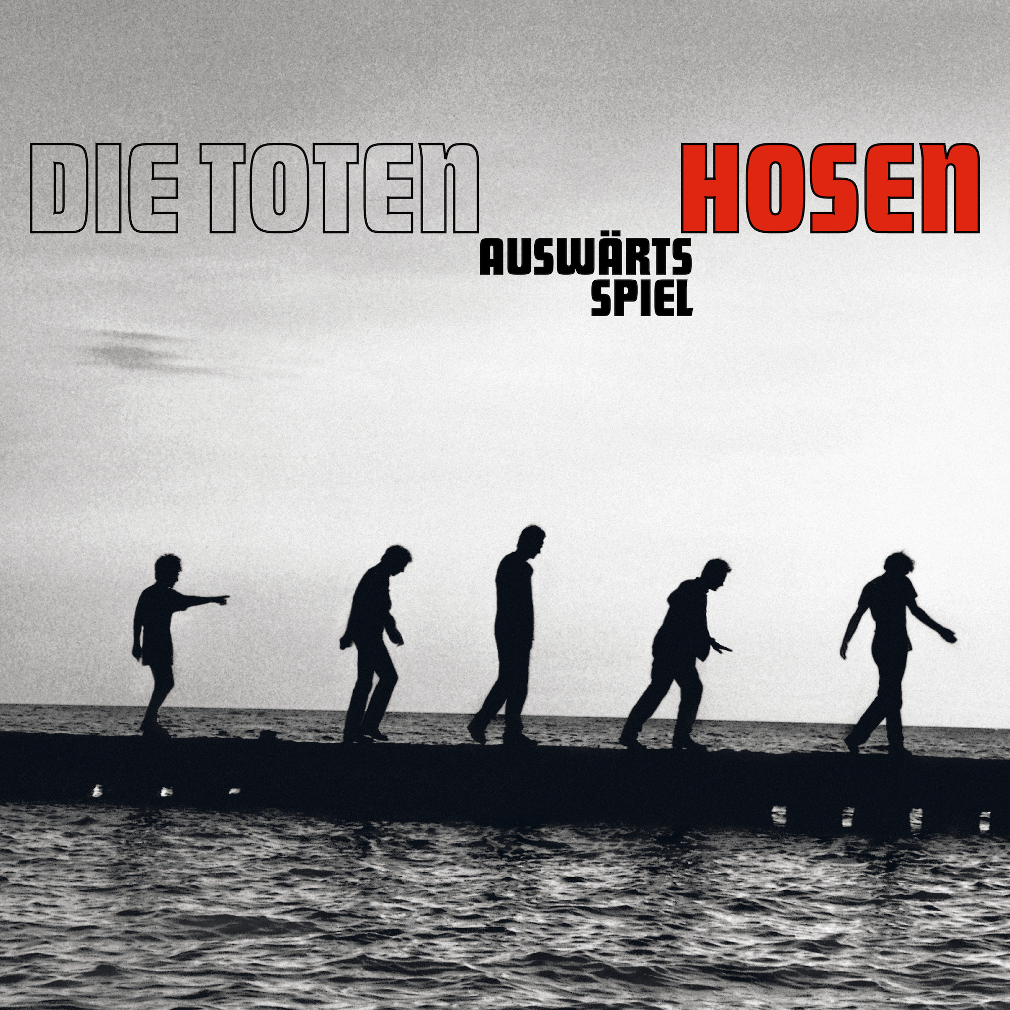 Fünf Personen in Silhouette gehen auf einem Steg am Meer, überlagert mit Text.