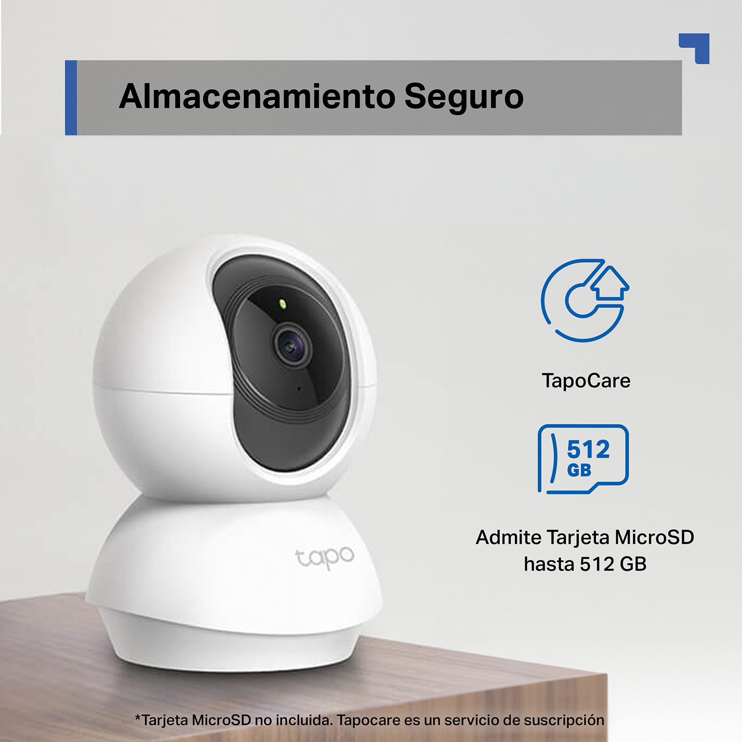 Cámara de seguridad Tapo blanca sobre mesa de madera con iconos de TapoCare y MicroSD de 512GB.
