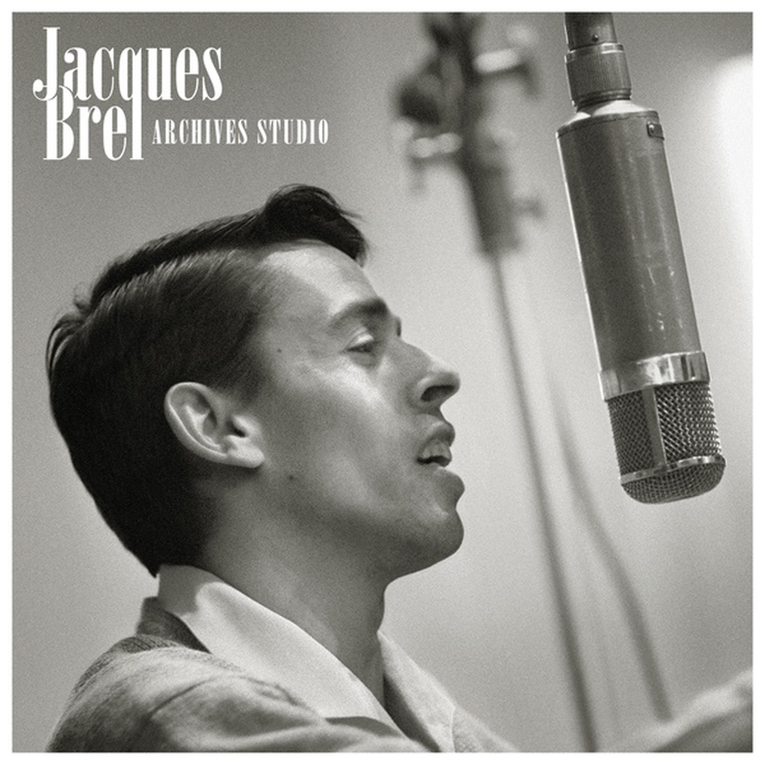 Black and white photo of Jacques Brel singing into a microphone, with text "Jacques Brel Archives Studio".