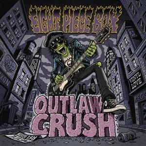 Ein grünköpfiger Zombie mit Gitarre rockt vor einer düsteren nächtlichen Stadtkulisse.