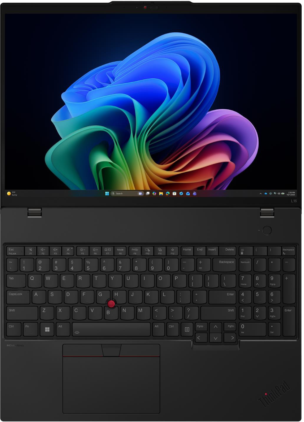 Fekete laptop élénkkék képernyőháttérrel és háttérvilágítású billentyűzettel.