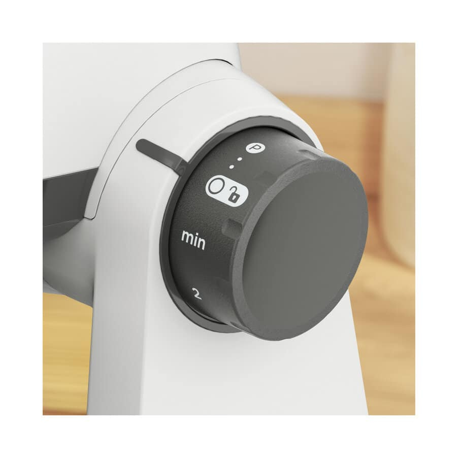 Perilla de control gris con configuraciones de mín y máx en un electrodoméstico blanco.