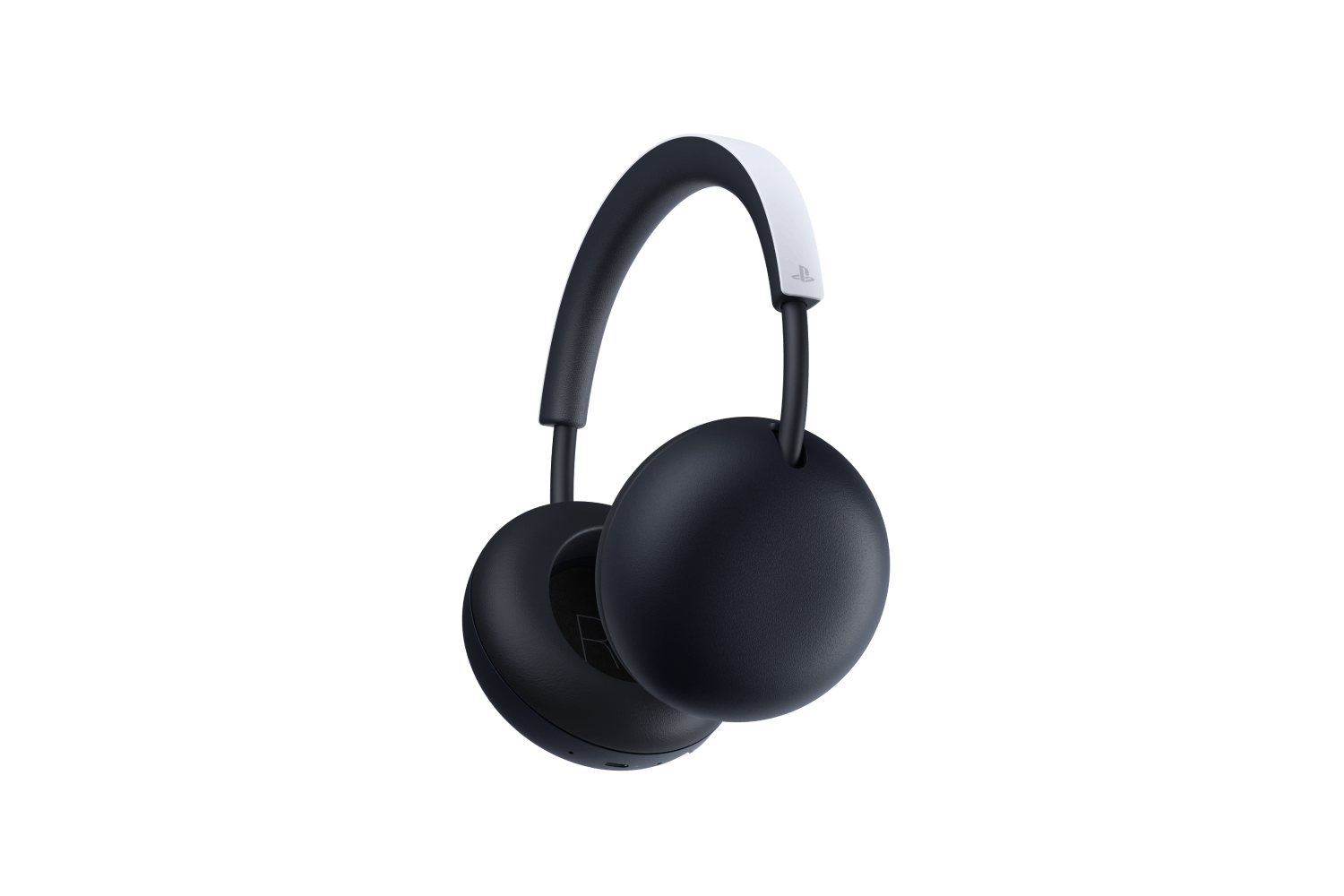Auriculares inalámbricos circumaurales en blanco y negro sobre un fondo negro.