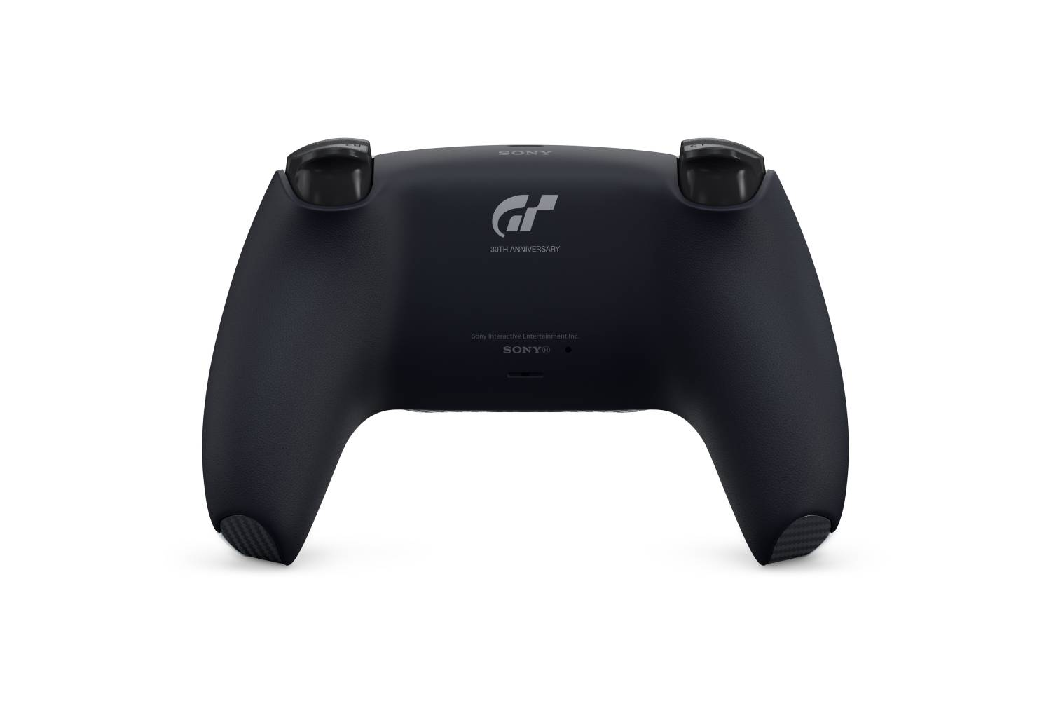 Vista trasera de un mando negro de PlayStation 5 con logotipo GT y texto 30th Anniversary sobre fondo blanco.