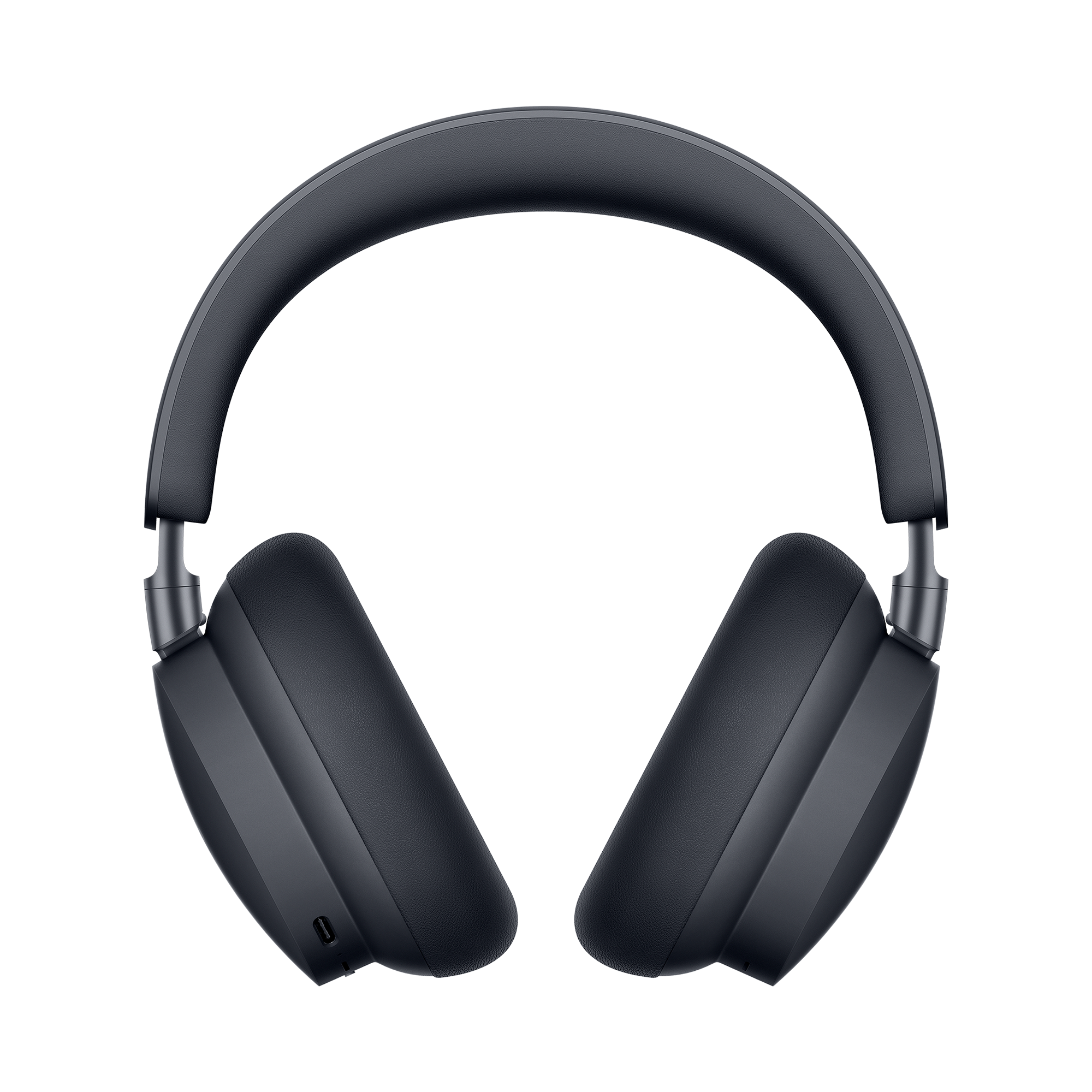 Auriculares inalámbricos de diadema oscuros sobre fondo negro.