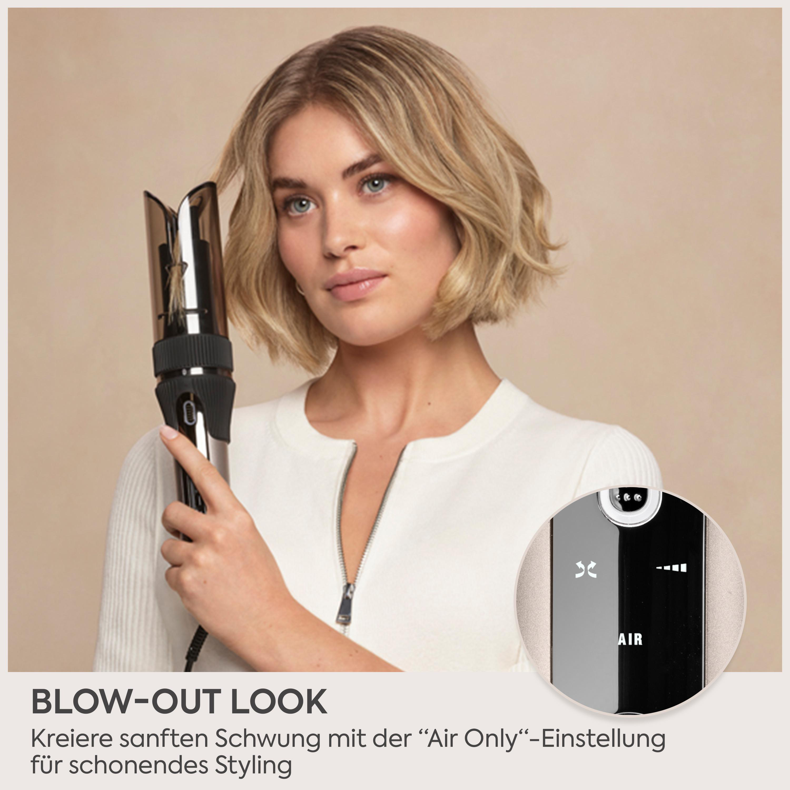 Eine blonde Frau hält einen automatischen Lockenstab, nahaufnahme des Displays mit Air-Einstellung.