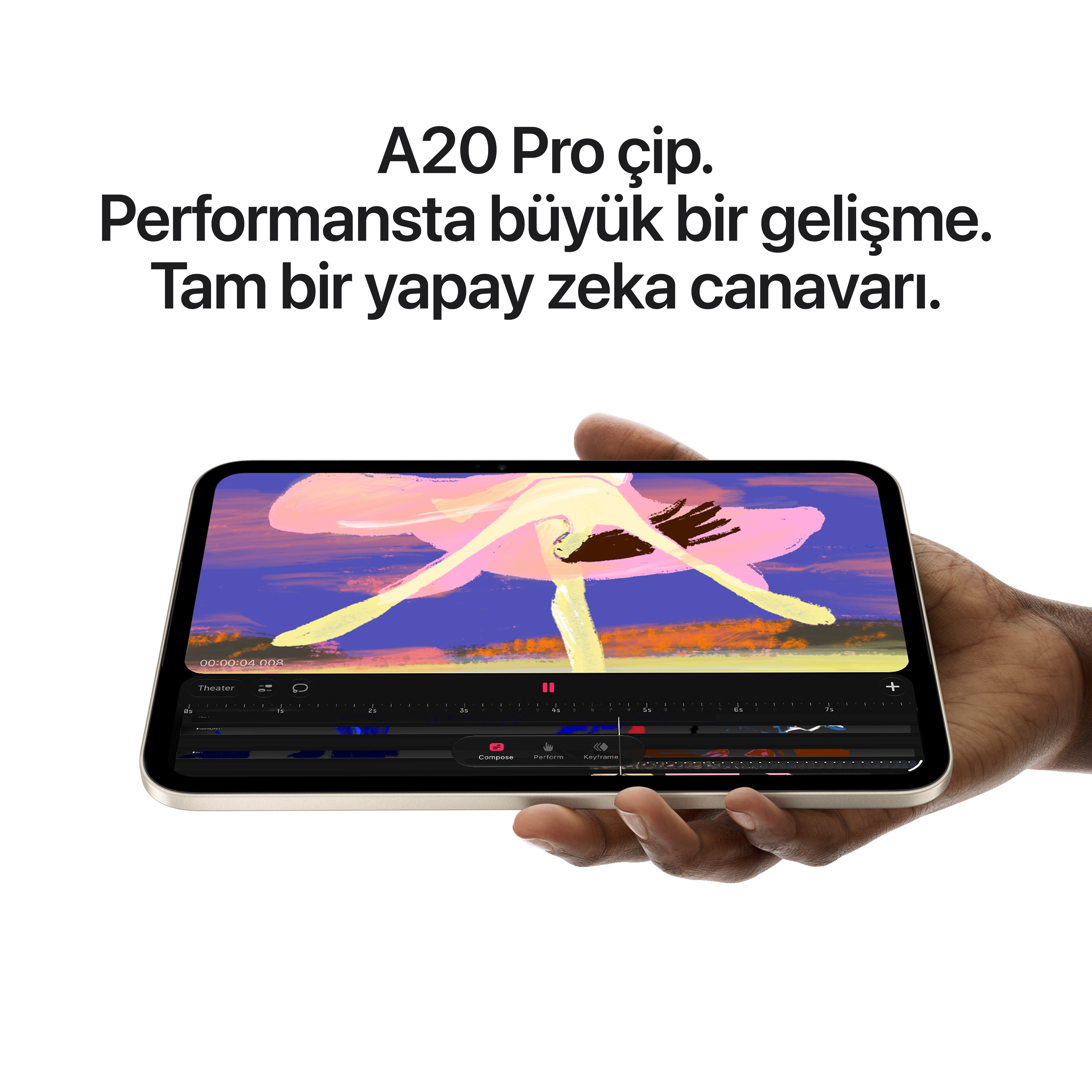 Bir el, üzerinde Türkçe metin bulunan bir video düzenleme uygulaması açık olan tableti tutuyor.
