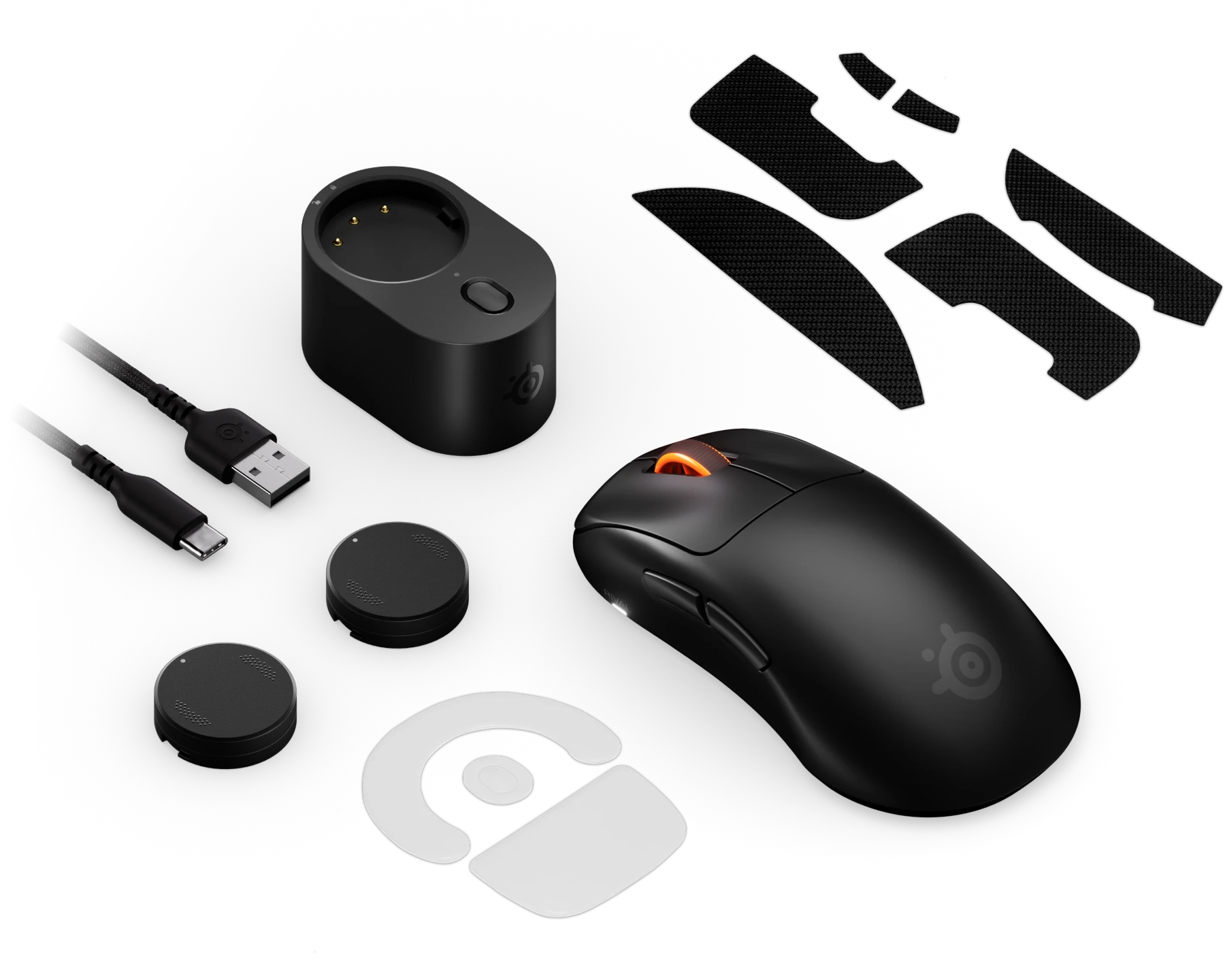 Fekete vezeték nélküli gamer egér, töltődokkoló, USB kábel, markolat szalag és csere korongok fekete alapon.