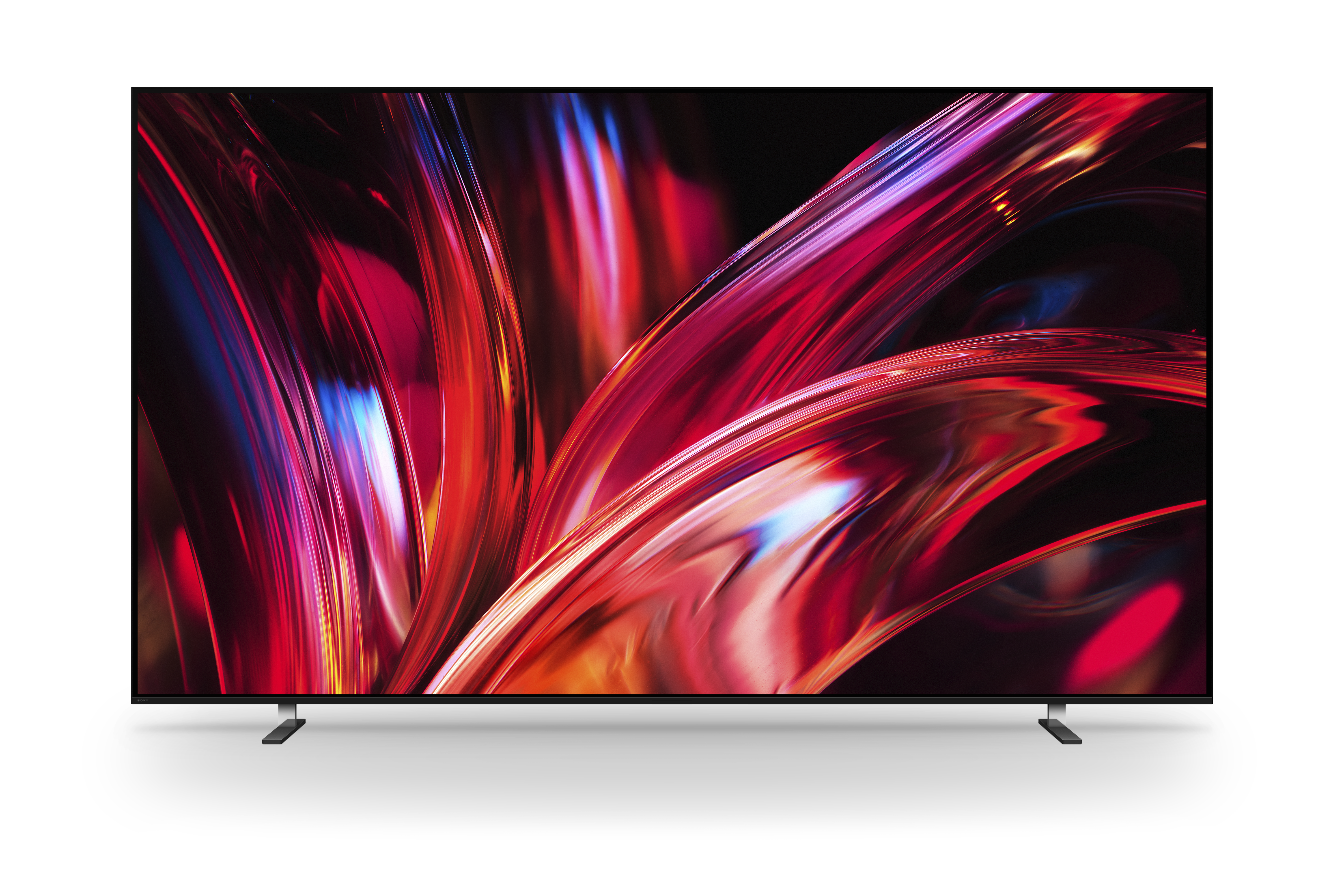 Egy modern televízió vékony kerettel piros, kék és fehér fénycsíkokból álló absztrakt grafikát jelenít meg.