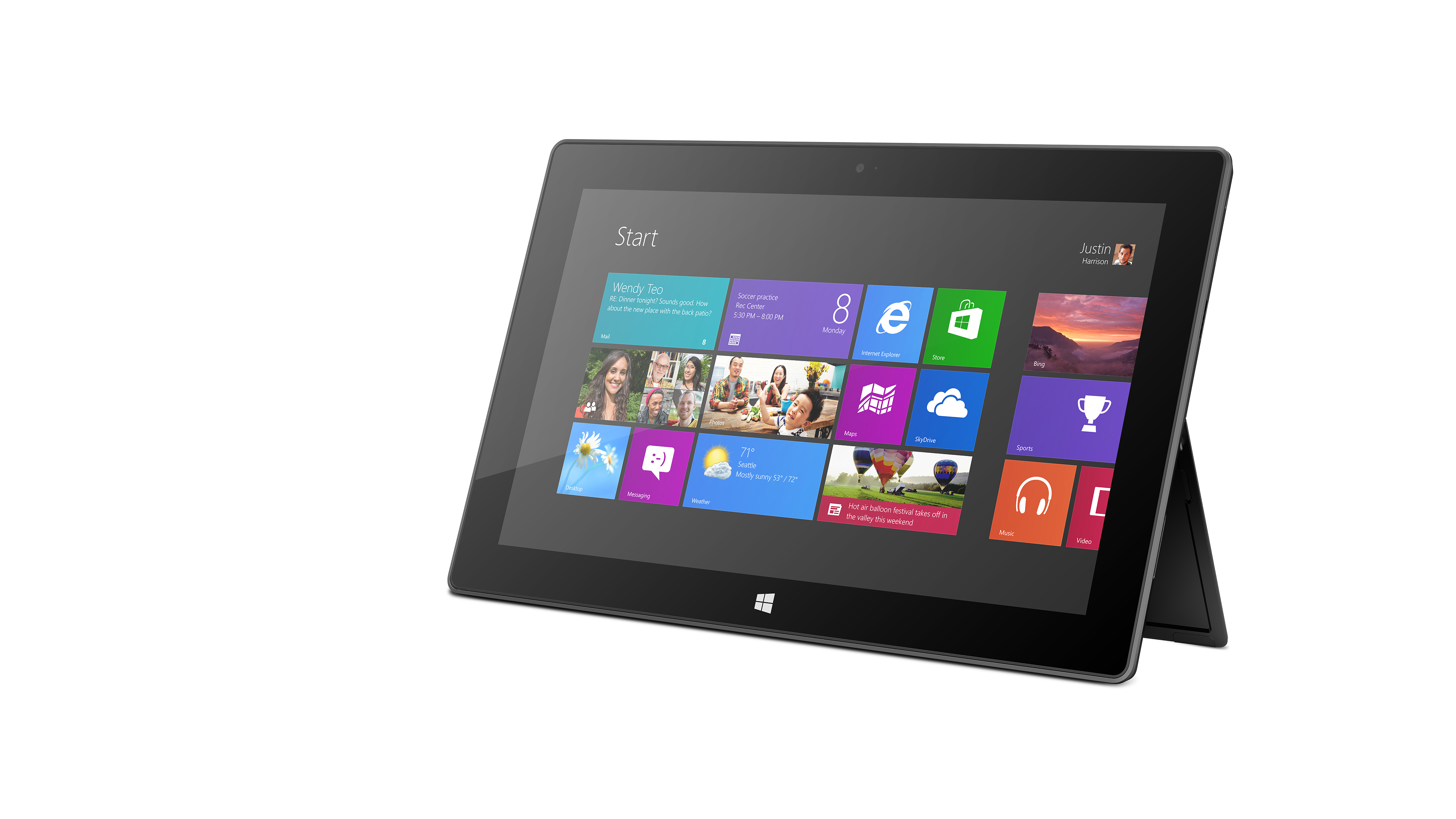 Ein schwarzes Tablet mit Windows-Oberfläche. Der Bildschirm zeigt verschiedene App-Symbole.