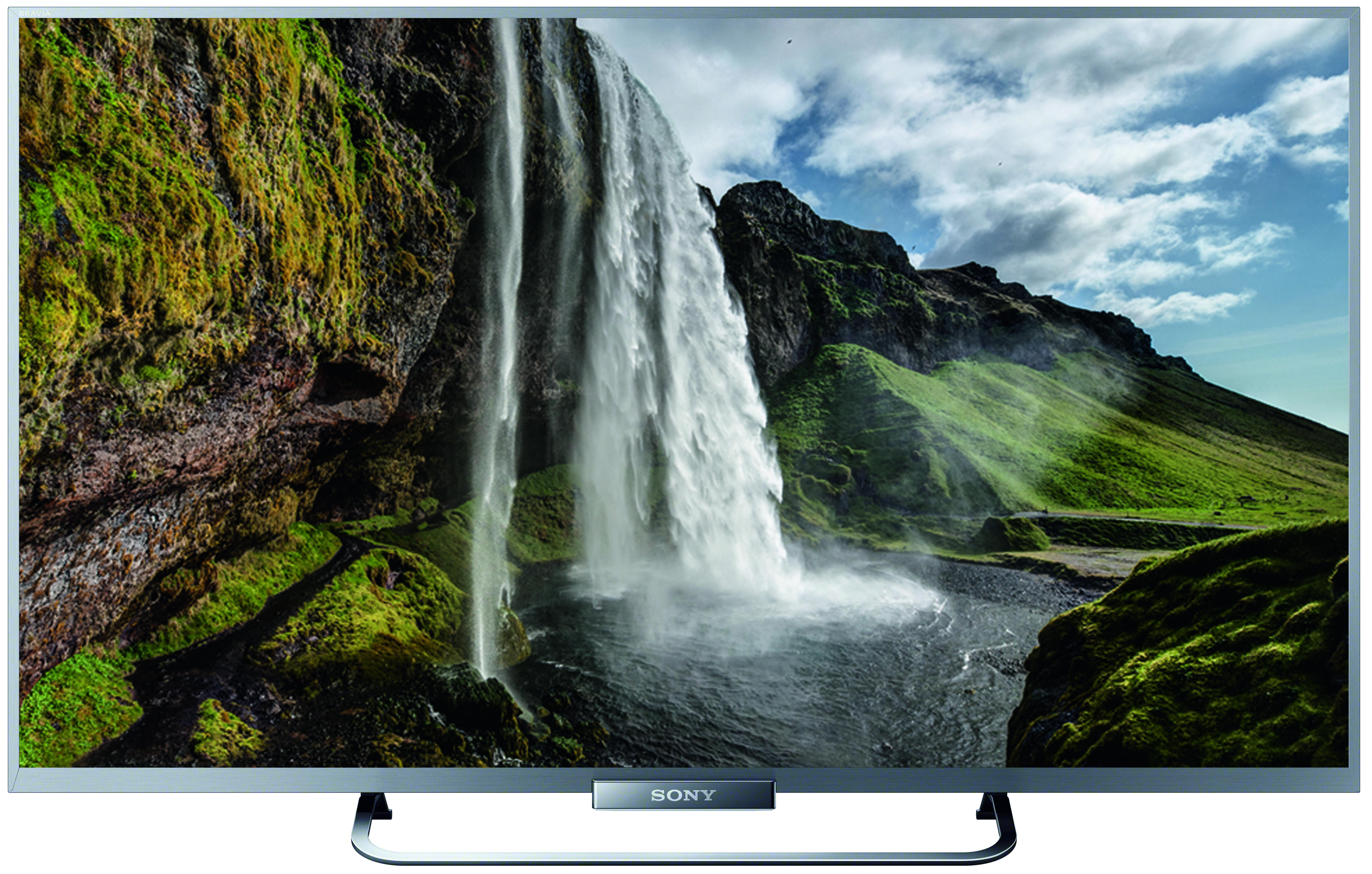 Ein Sony-Fernseher mit einer Wasserfallszene mit üppigen grünen Klippen.