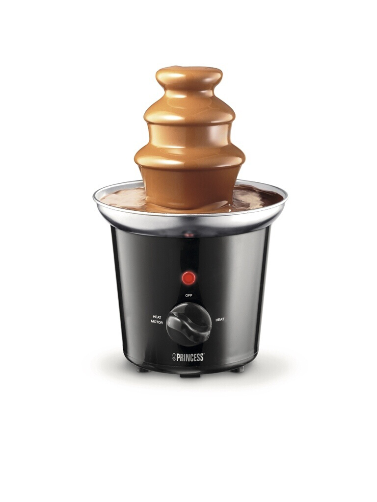 Fontaine à chocolat avec chocolat coulant. Base noire avec commandes.