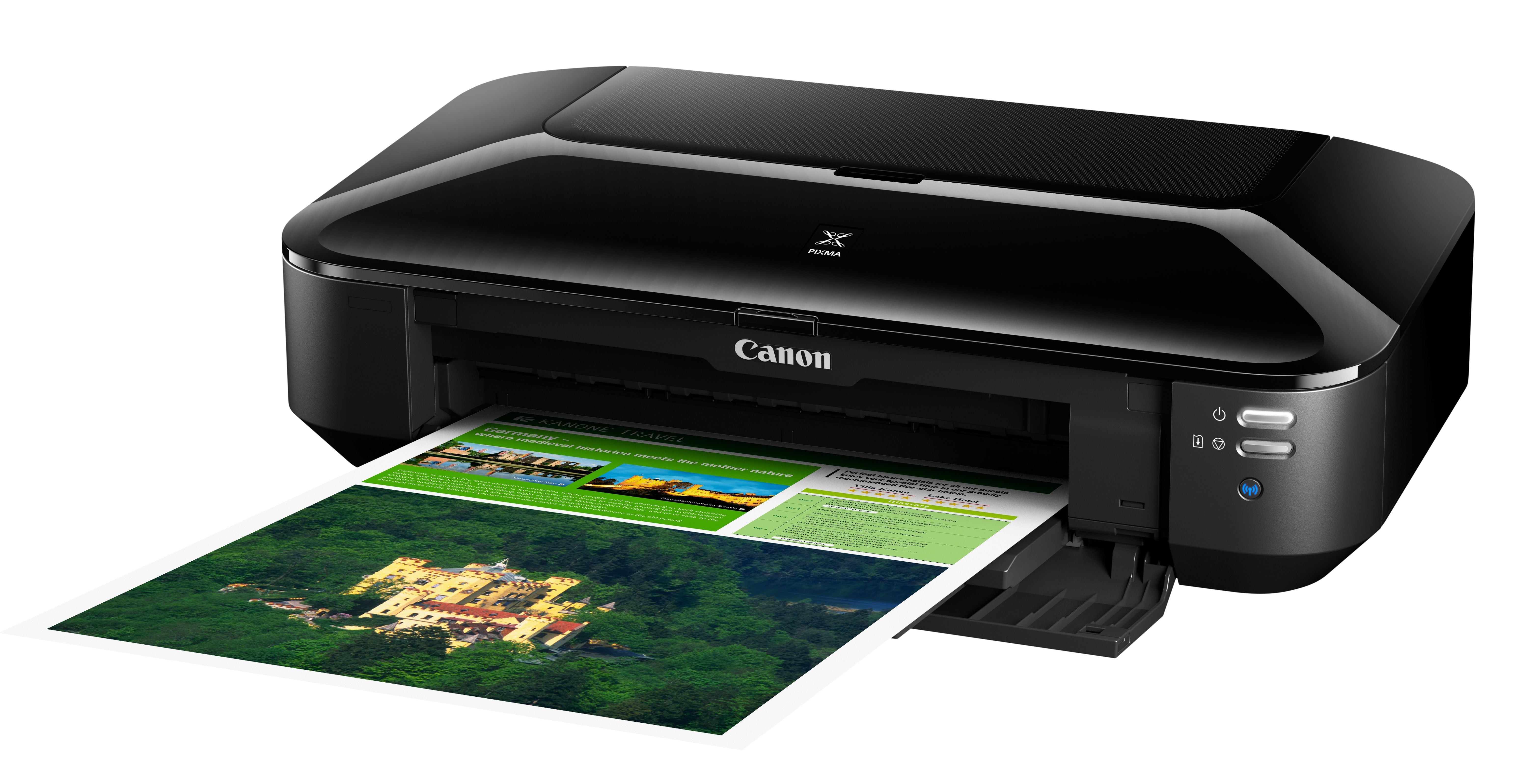 A black Canon printer with a paper showing a landscape image.