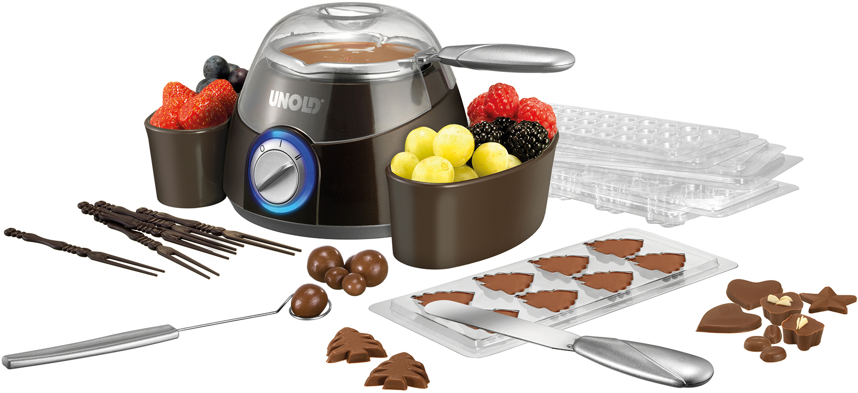Schokoladen-Set mit Schmelztopf, Schokoladenformen und verschiedenen Früchten.