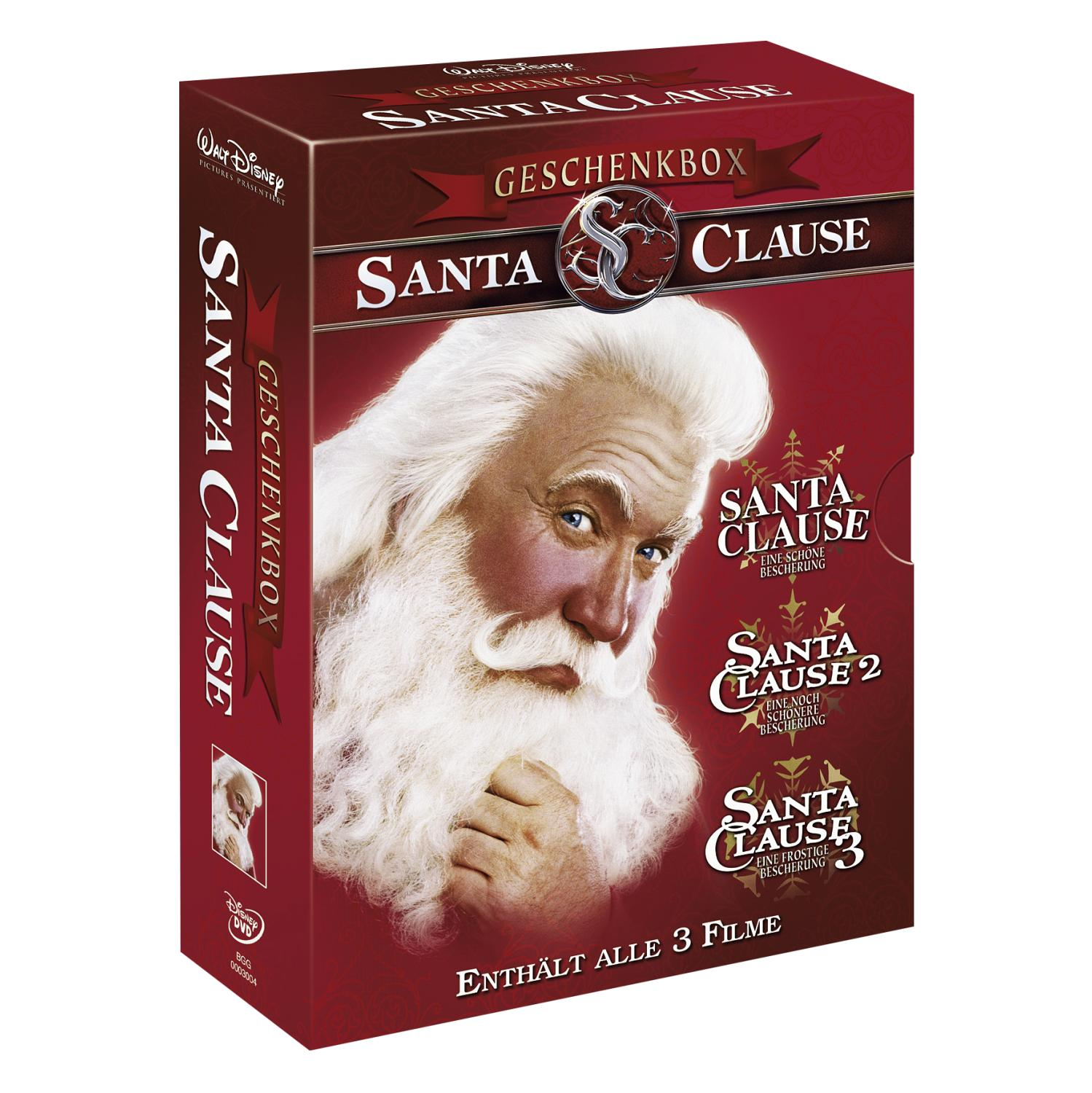 Santa Clause Geschenkbox-Set. Santa-Gesicht auf der Box, mit den Filmtiteln.