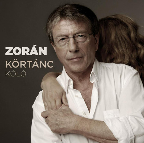 Zorán album borítója. Férfi szemüveggel, nő háta. Szöveg: Zorán, Körtánc, Kölö. Fekete-fehér.