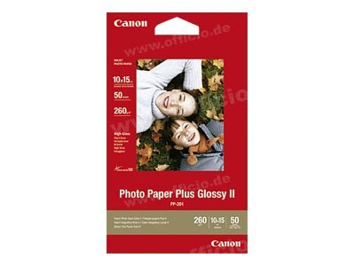 Een Canon fotopapier verpakking. Het toont twee mensen die op bladeren liggen. Tekst bevat 'Photo Paper Plus Glossy II', en nummers zoals 10.15 en 260.