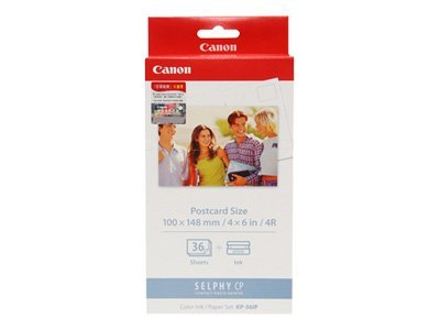 Canon photo paper pack. People in photo on front. Text: Canon, Selphy CP.